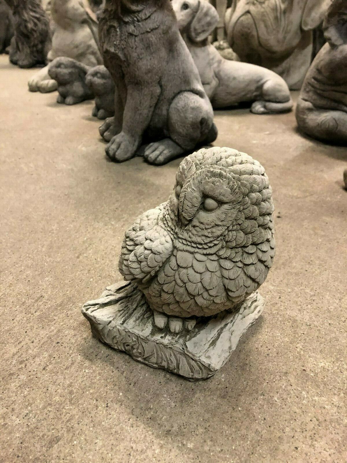 Handcrafted Stone Owl on Log Garden Decor with intricate feather texture, made from durable limestone for year-round outdoor use.