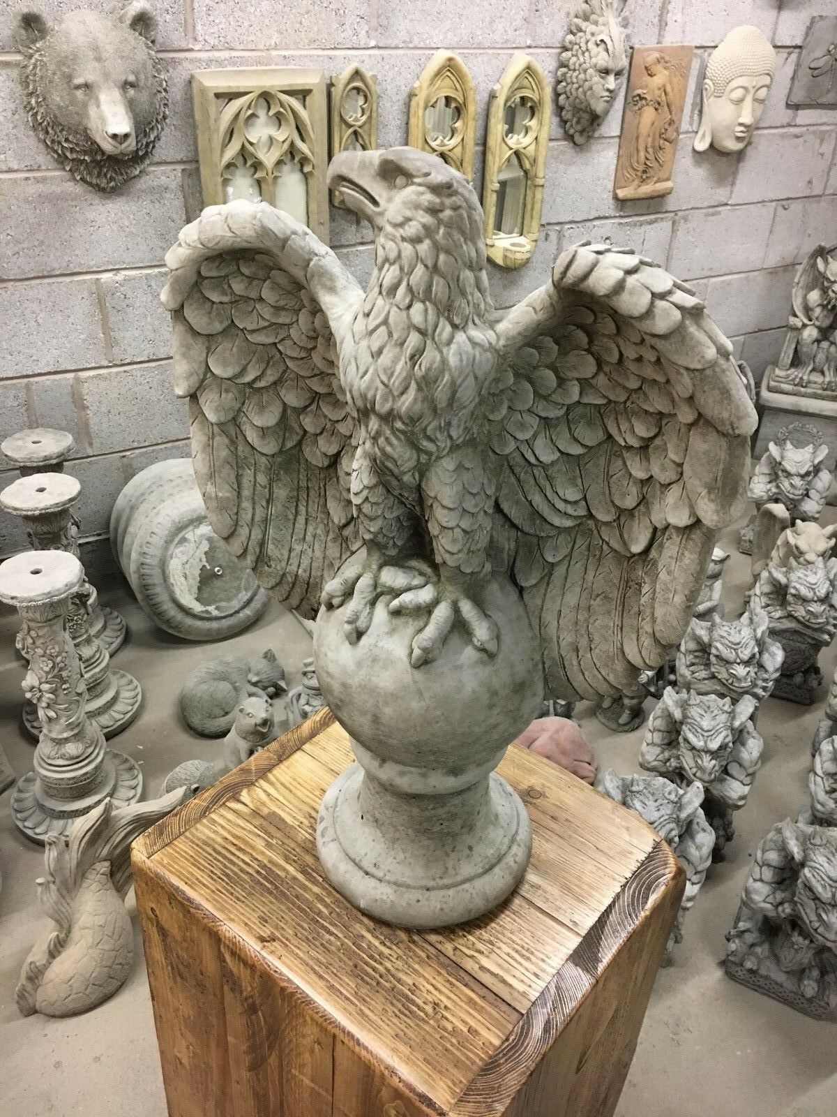 Durable limestone eagle sculpture for garden use, showcasing detailed feathers and classic design for outdoor charm.