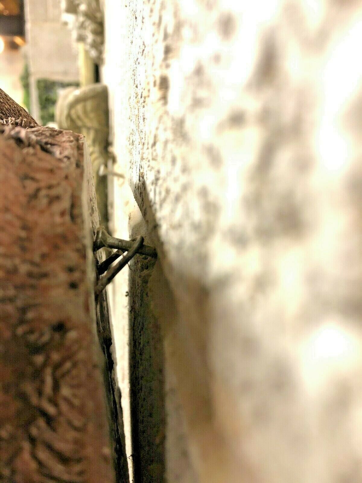 Close-up side view of Fox Head Garden Plaque showing secure wall mounting and thickness of durable stone material.