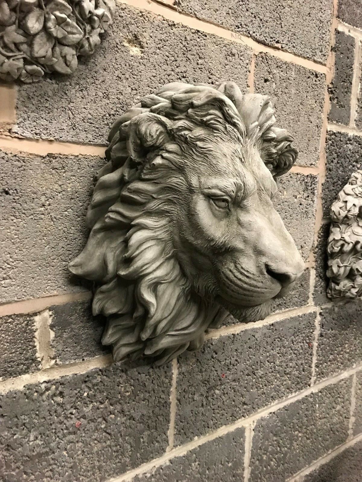 Angled profile of Stone King Lion Wall Plaque highlighting lifelike facial features and durable stone design for home and garden walls.