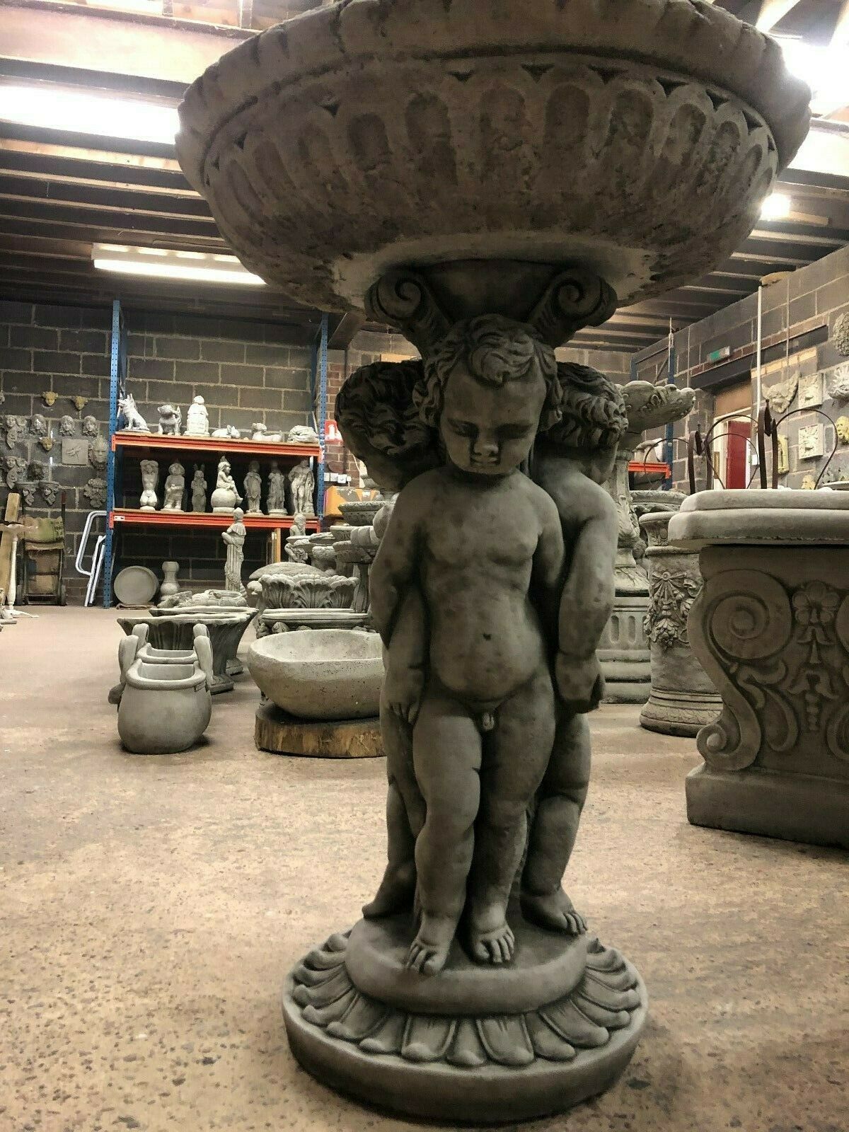 Full view of Cherub Garden Bird Bath - Stone Antique Finish showing deep basin and sculpted cherub base. Perfect for patios and gardens.