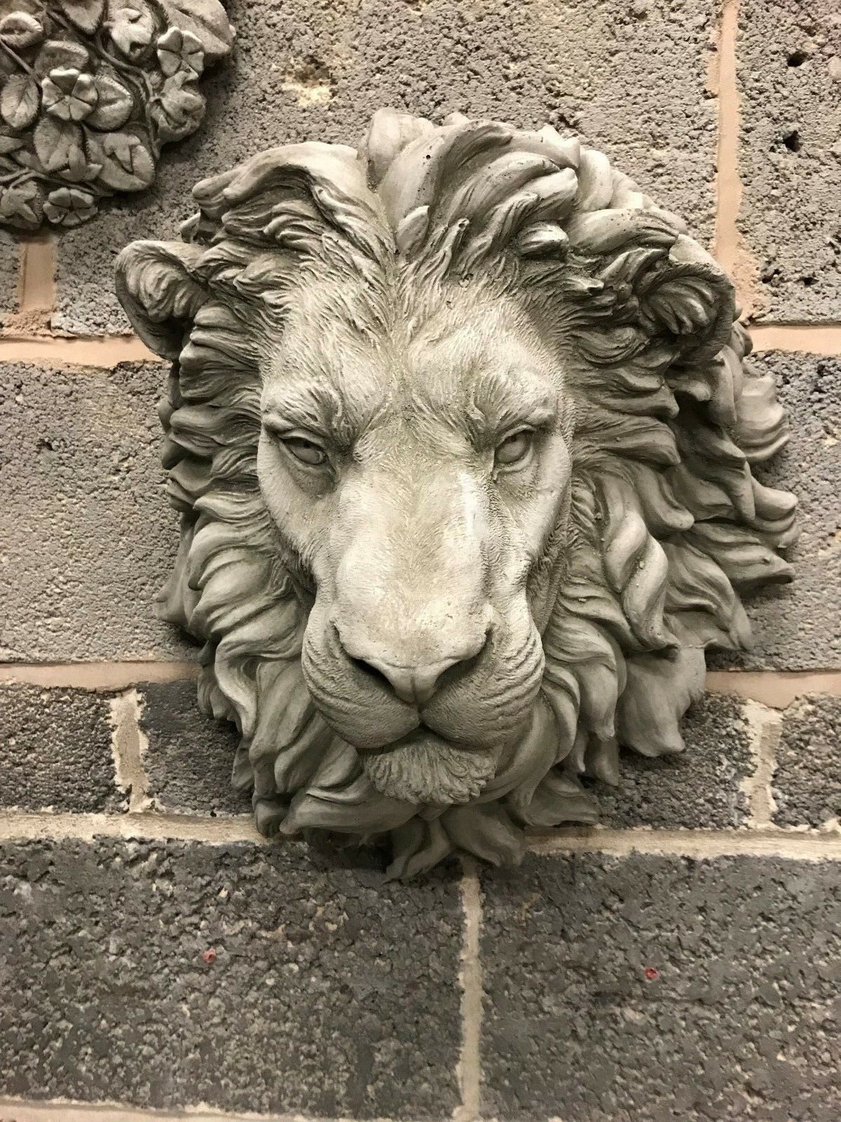 Front-facing Stone King Lion Wall Plaque with majestic expression and weather-resistant stone finish, perfect for outdoor wall decor.
