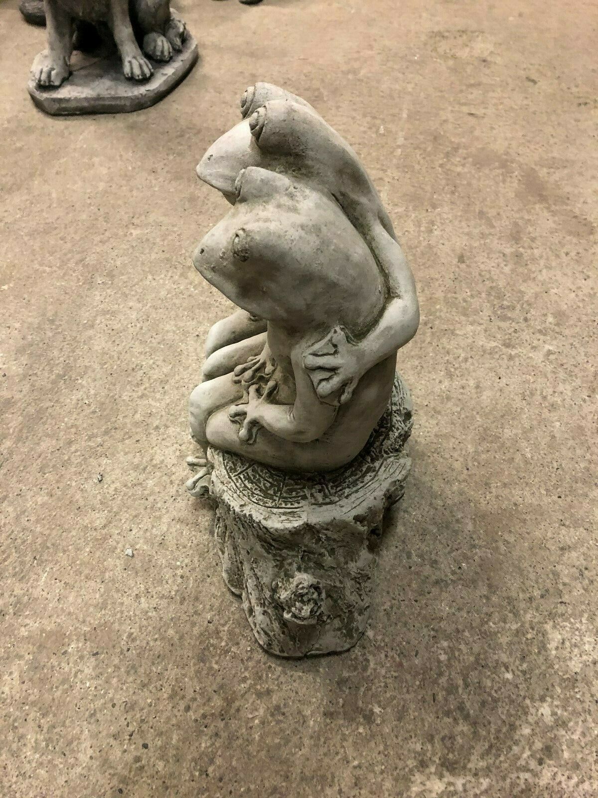 Top view of Elegant Frog Couple Ornament showing detailed craftsmanship and entwined arms. Unique stone decor for garden or balcony settings.