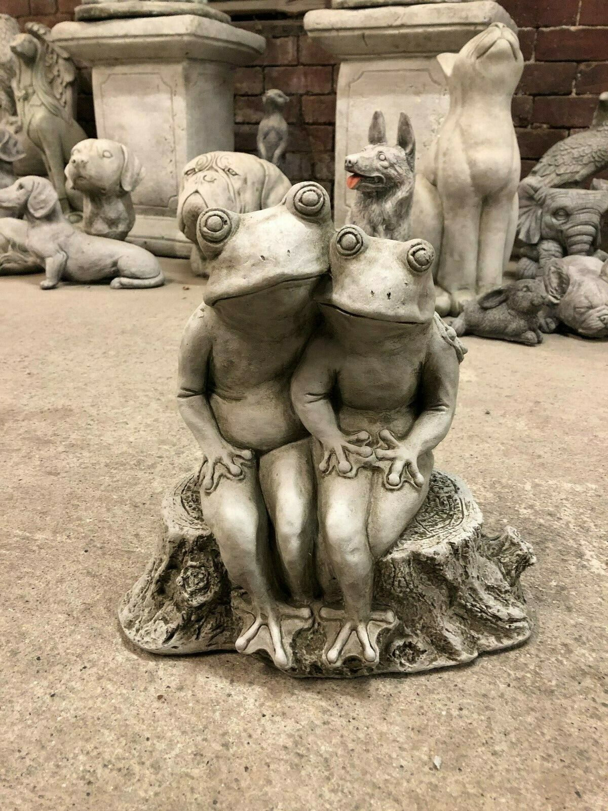 Front-facing Elegant Frog Couple Ornament with expressive features and rustic finish. Adds character to any garden or lawn sculpture collection.