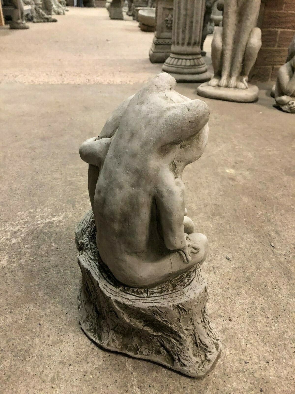 Rear side of Elegant Frog Couple Ornament highlighting natural stone texture and loving embrace. Ideal for outdoor garden or patio decoration.