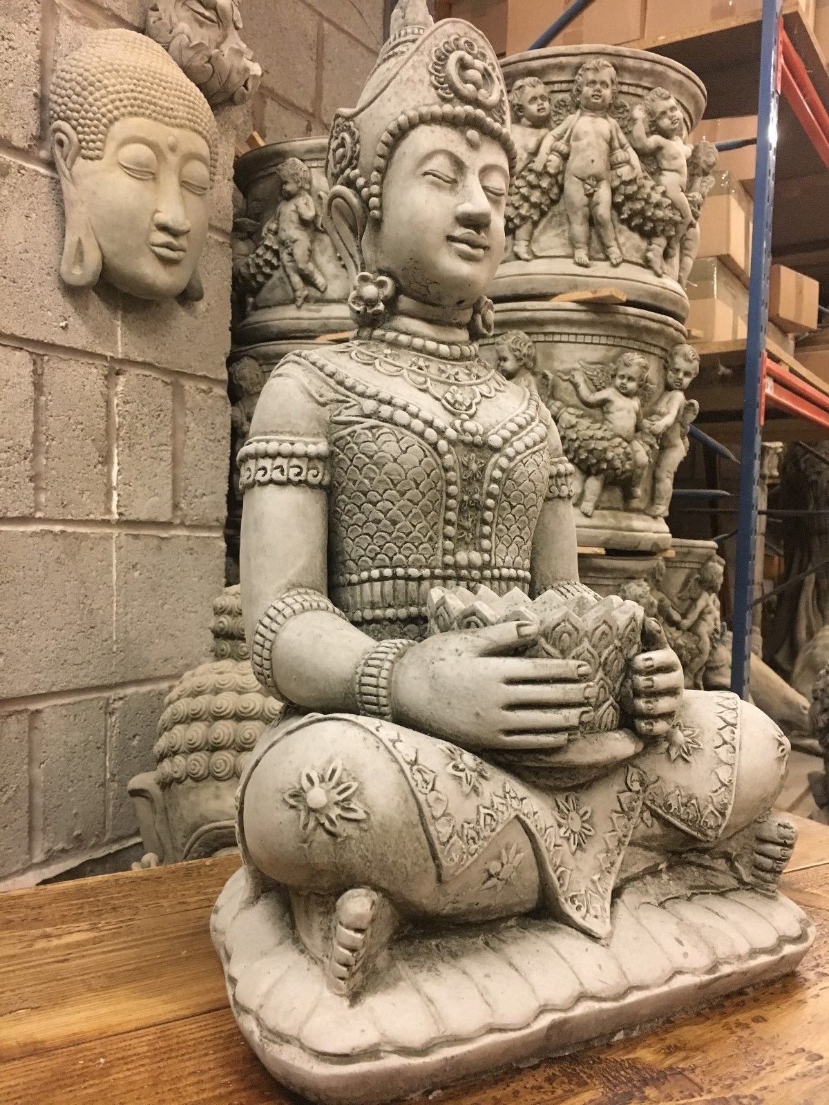 Stone Buddha Garden Statue in antique grey finish, seated in lotus pose with ornate detailing, ideal for outdoor garden decor. Height 55cm, 23kg weight.