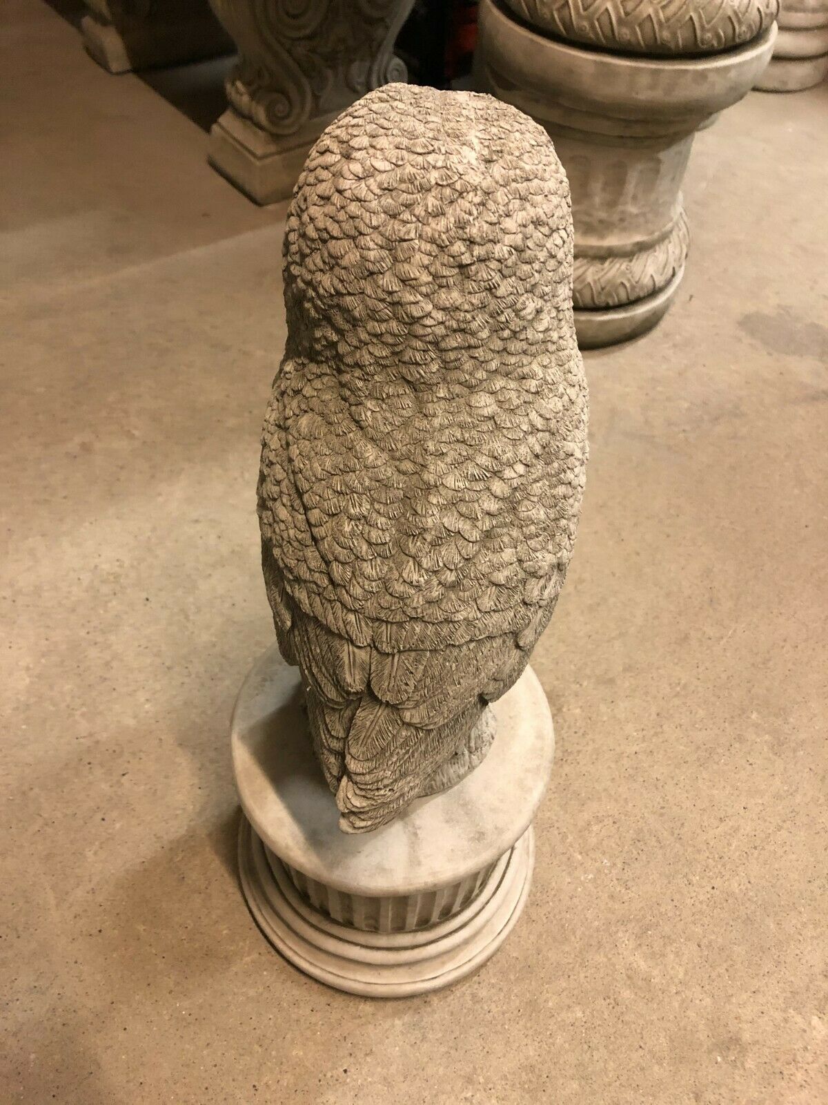 Rear view of Stone Owl Plinth Statue - Garden Decor | Solid Limestone displaying detailed feather pattern and solid stone craftsmanship.