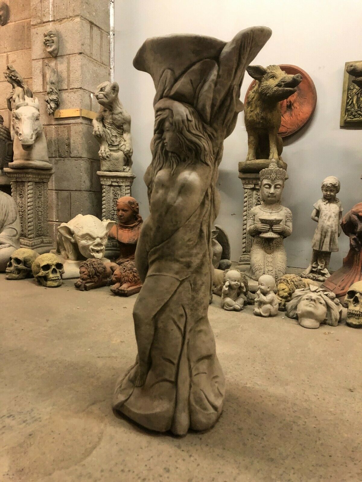 Elegant Stone Garden Planter Lady Statue in antique grey, showcasing detailed female form and durable stone design for outdoor garden decor.