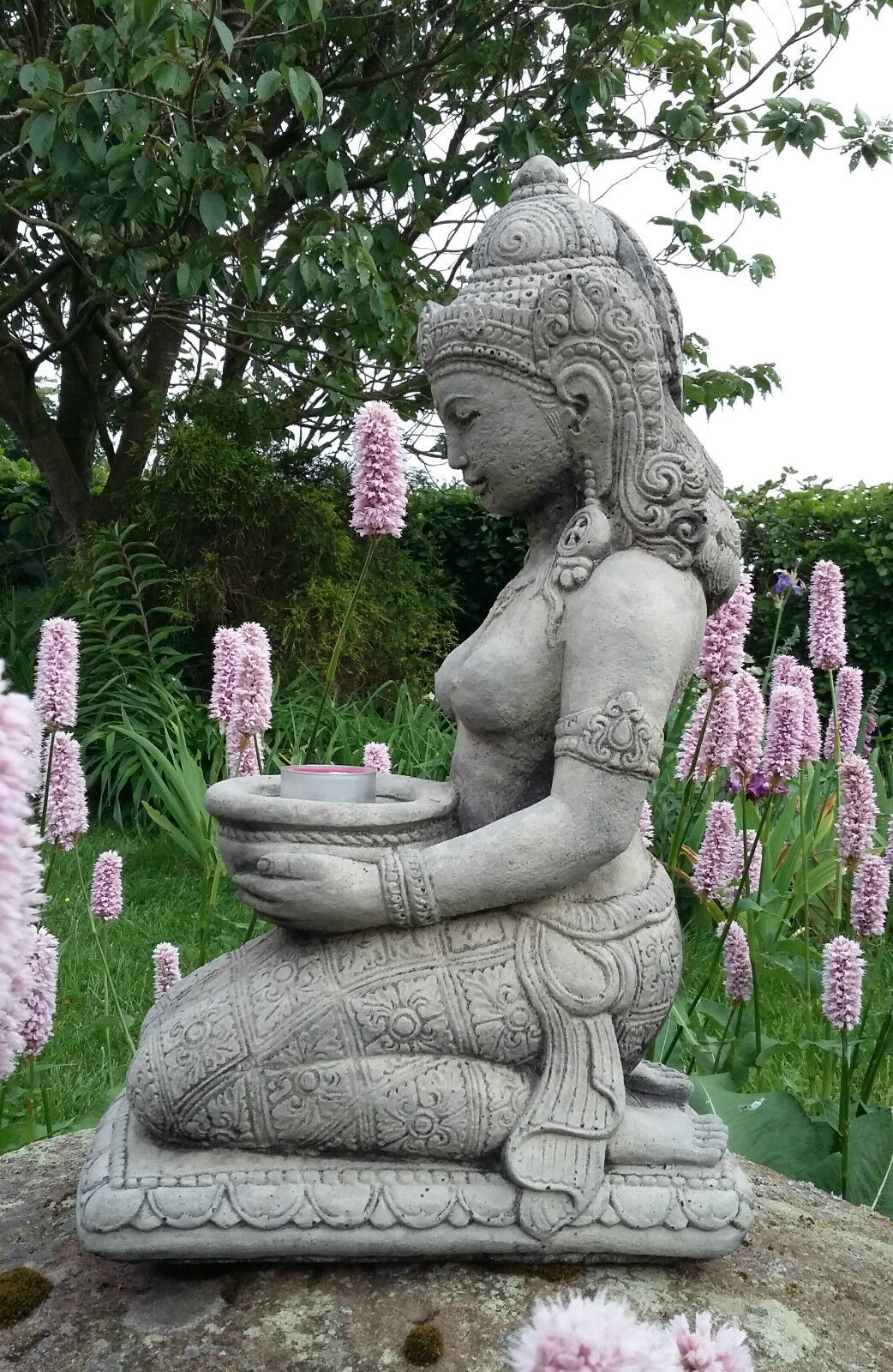 Side view of Geisha Statue Candle Holder in stone, showcasing intricate detailing and serene pose, ideal for outdoor garden ornamentation.