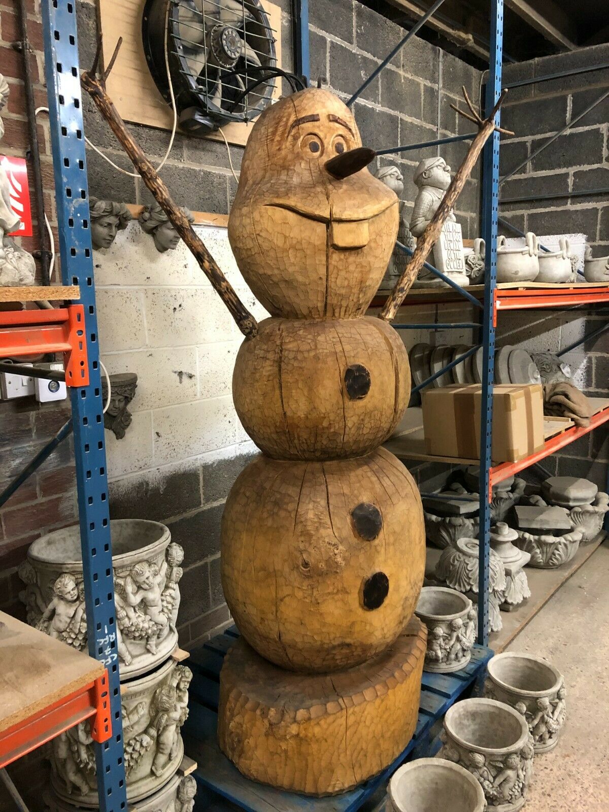 Large Wooden Olaf Garden Sculpture with detailed carving, perfect for outdoor decor or indoor display with high ceilings.