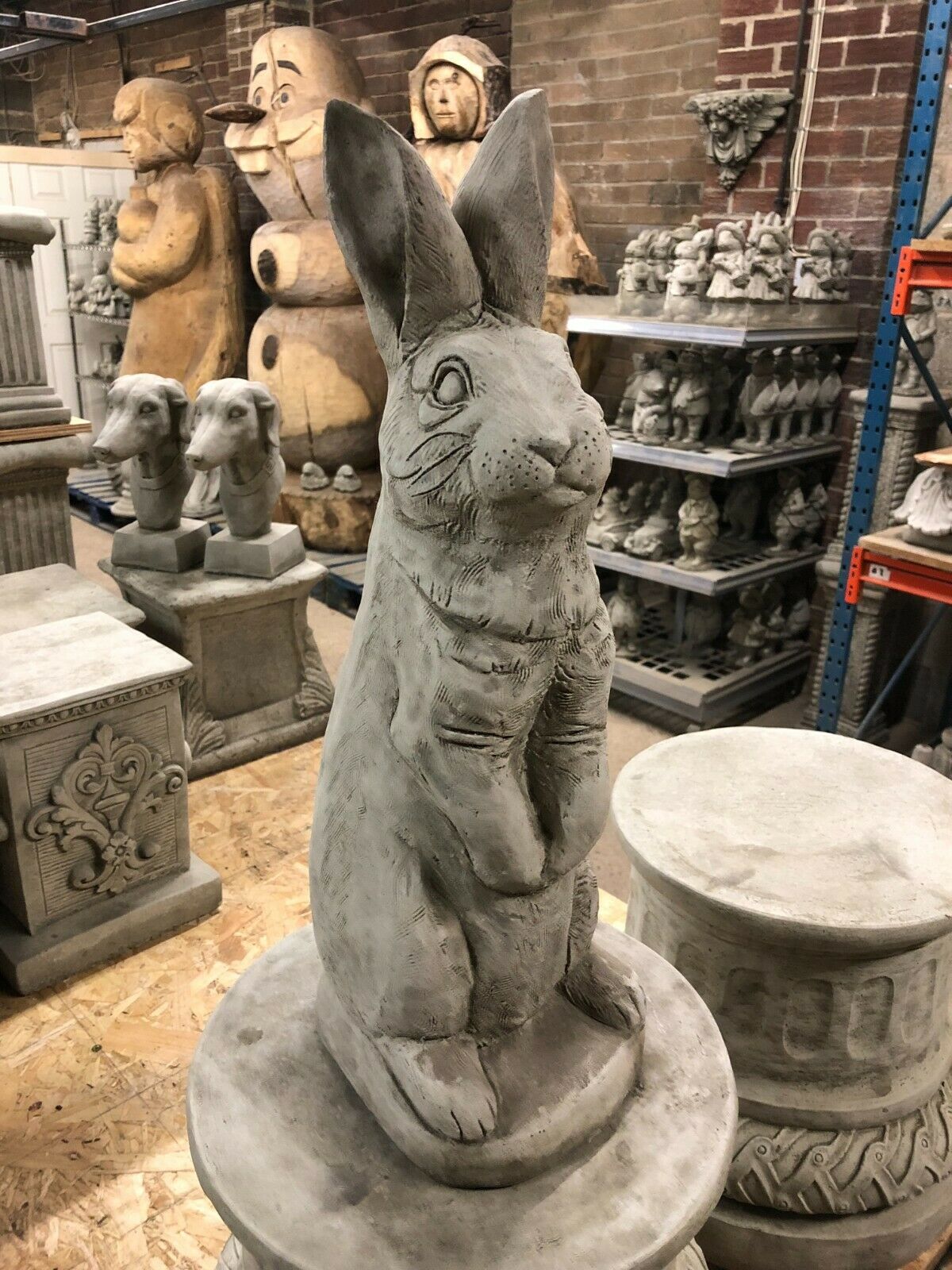 Detailed side view of Solid Bunny Ornament - Stone Rabbit Garden statue, ideal for patios or garden landscapes with weather-resistant stone design.