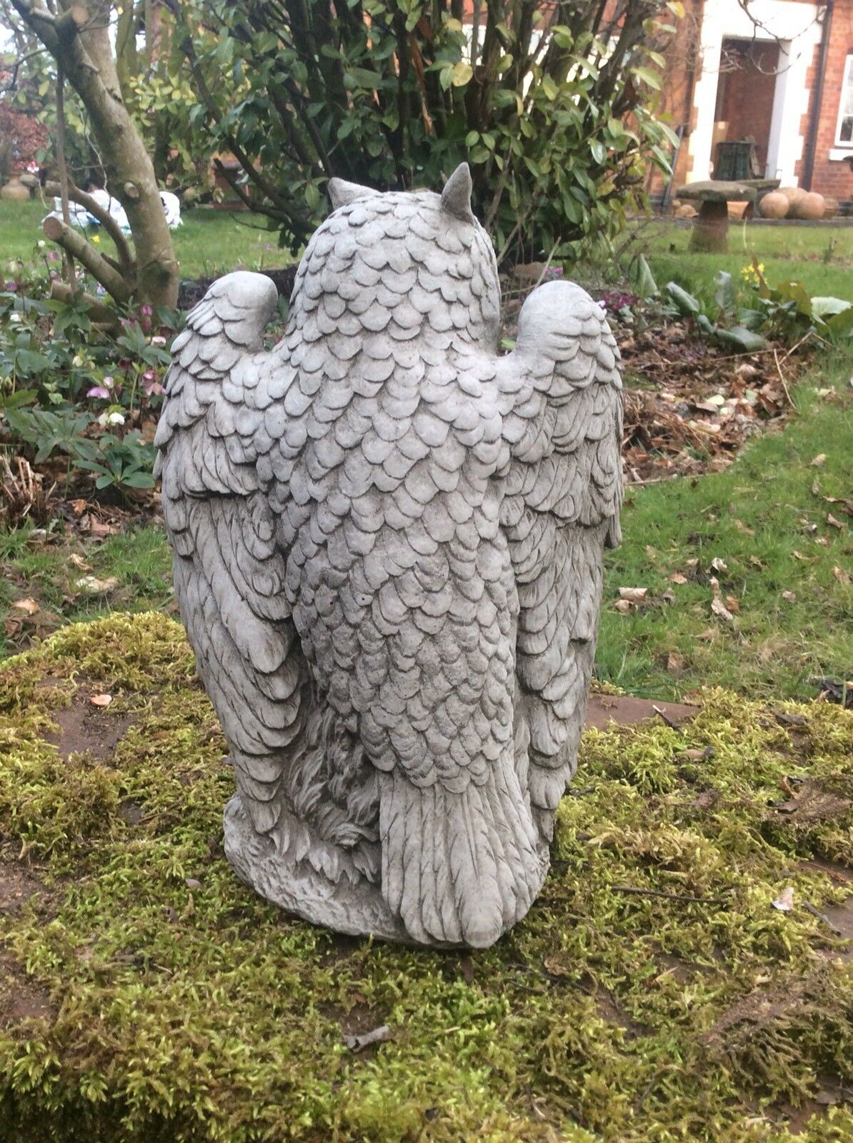 Rear view of Stone Owl Garden Statue - Antique Weatherproof Finish showing intricate feather texture, ideal for outdoor garden decor.