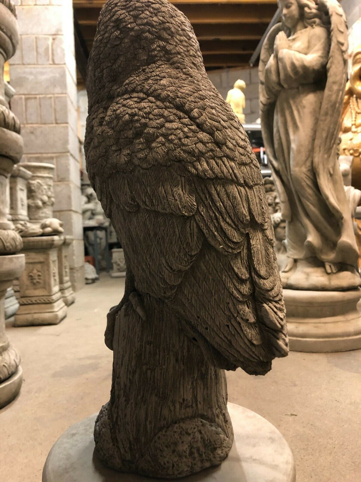 Back angle of Stone Owl Plinth Statue - Garden Decor | Solid Limestone showing layered feathers and sturdy plinth design.
