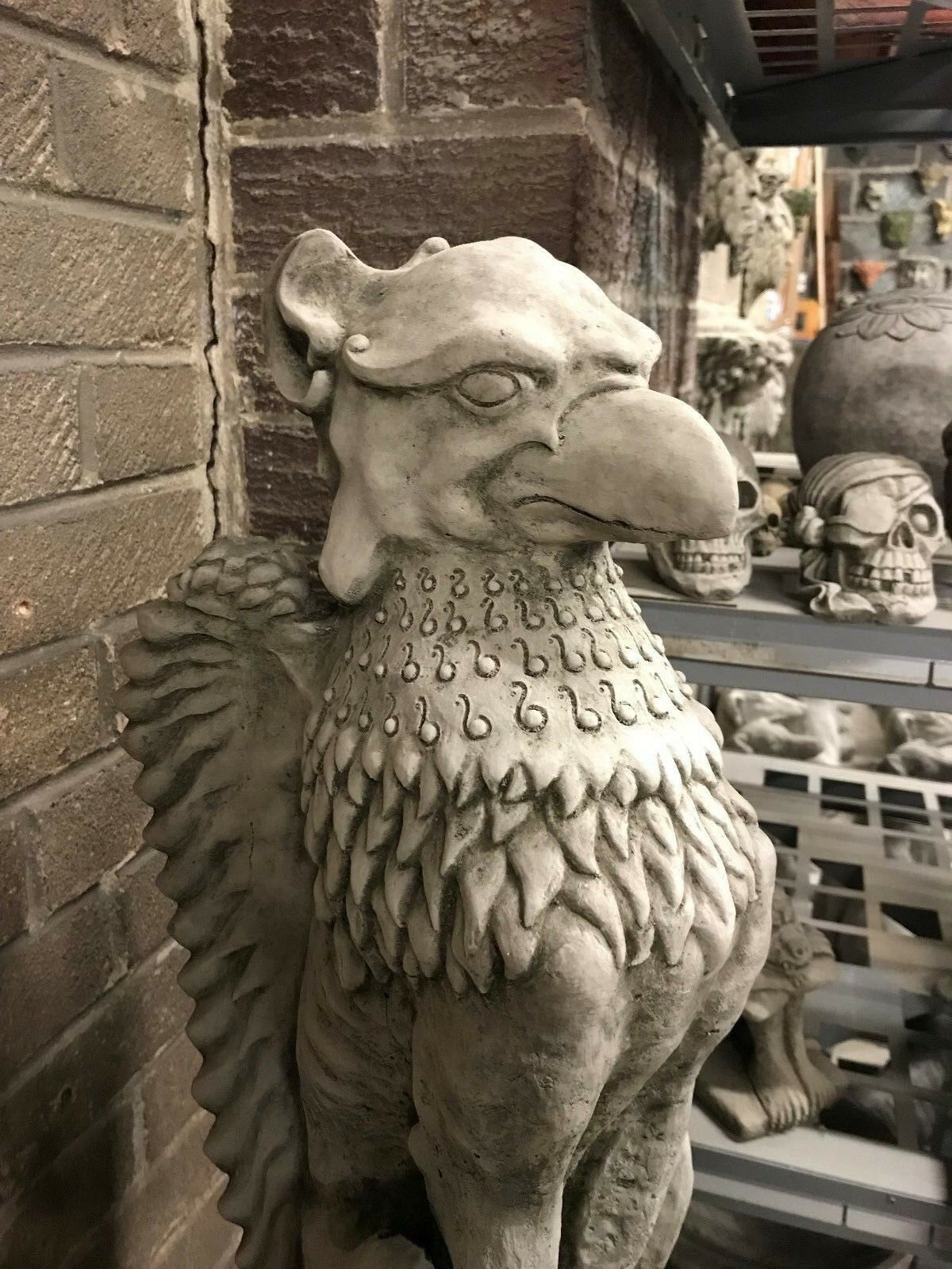 Close-up of a Stone Phoenix Garden Statue showing detailed feathers and fierce expression. Perfect for outdoor decor and mythical garden themes.