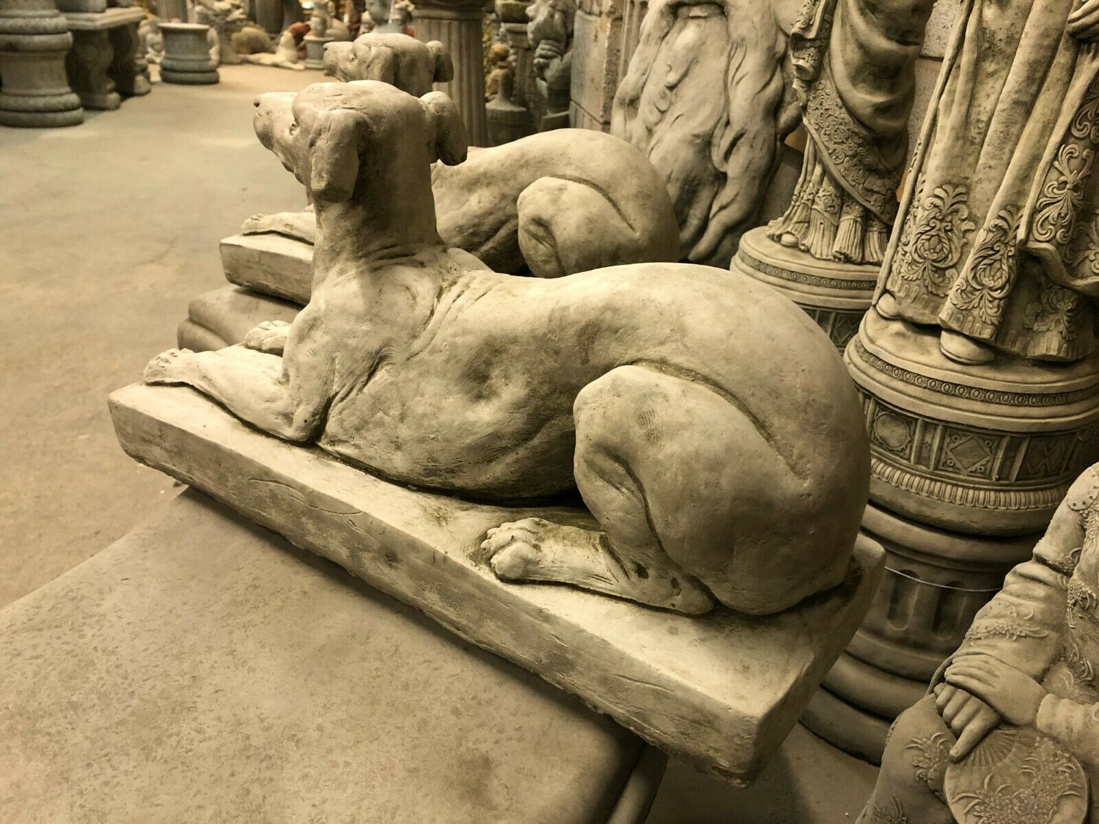 Side view of Greyhound Dog Statue in durable limestone, showcasing detailed craftsmanship for garden sculpture collections.
