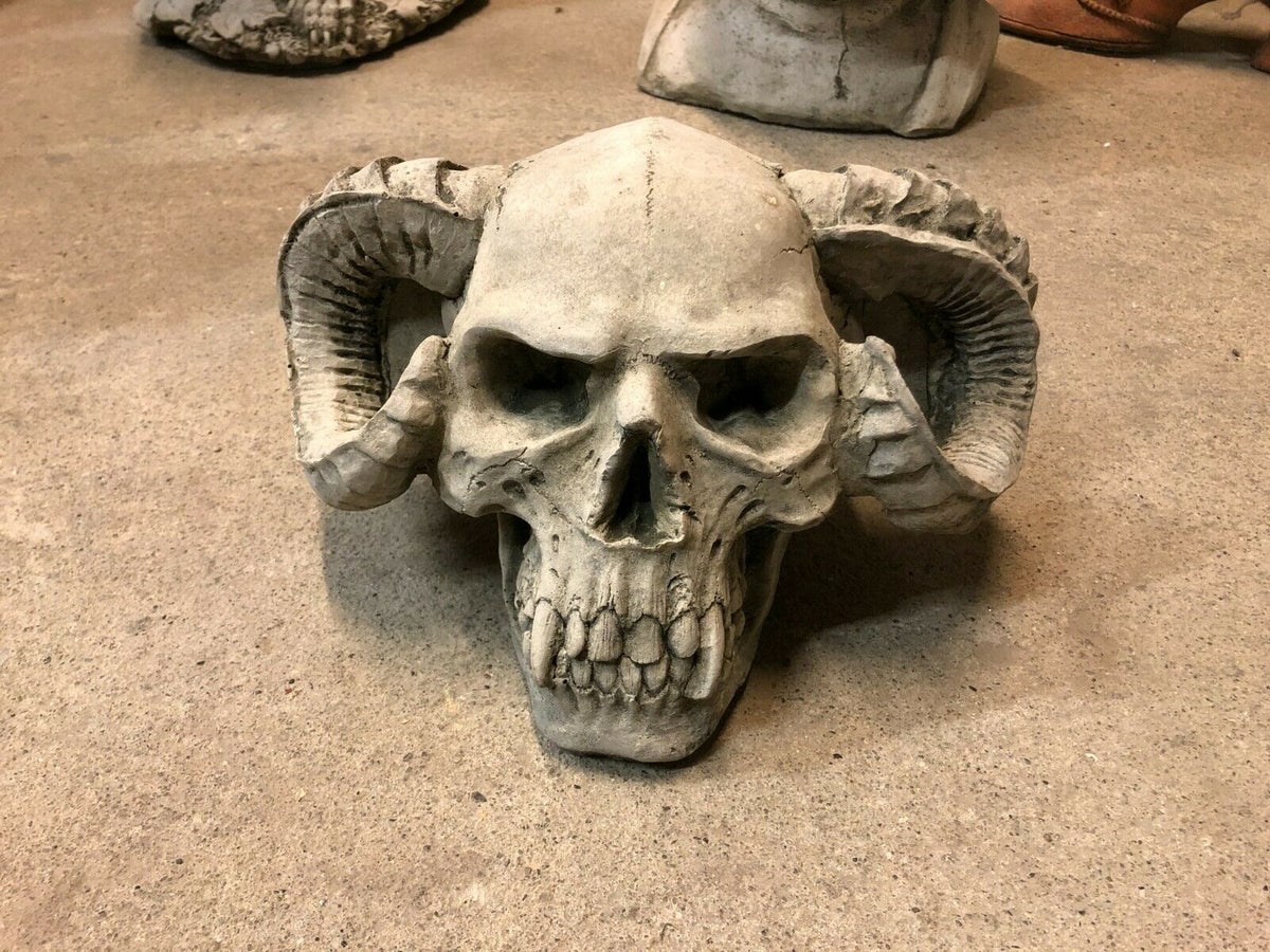 Front view of Skull Horn Design Ornament in limestone, showcasing realistic skull features and horn texture for outdoor garden use.