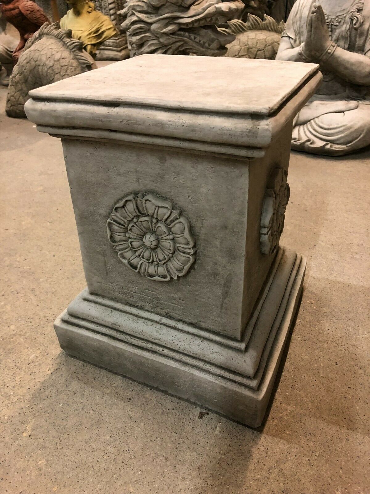 Yorkshire Rose Square Plinth in solid limestone with antique finish, ideal for garden sculpture display or decorative lawn pedestal.