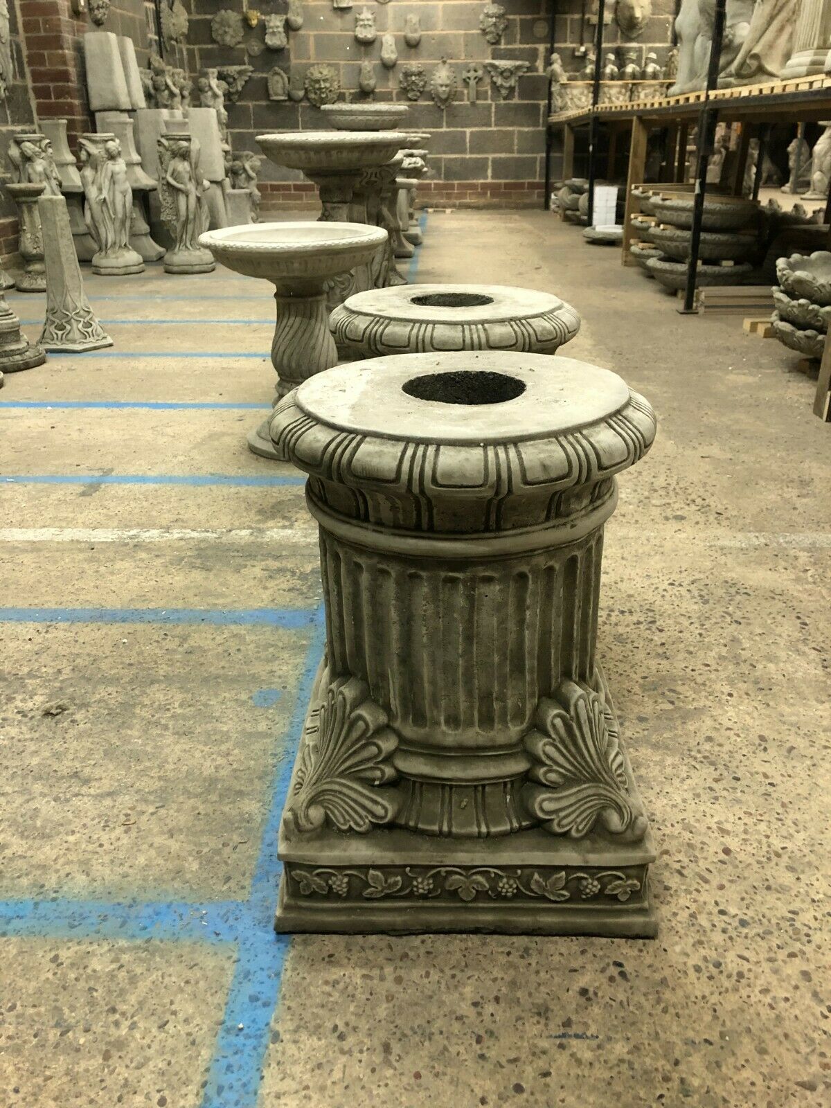 Top view of Garden Stone Pedestal Plinths showing round hollow center, suitable for securely mounting statues or decorative garden pieces.
