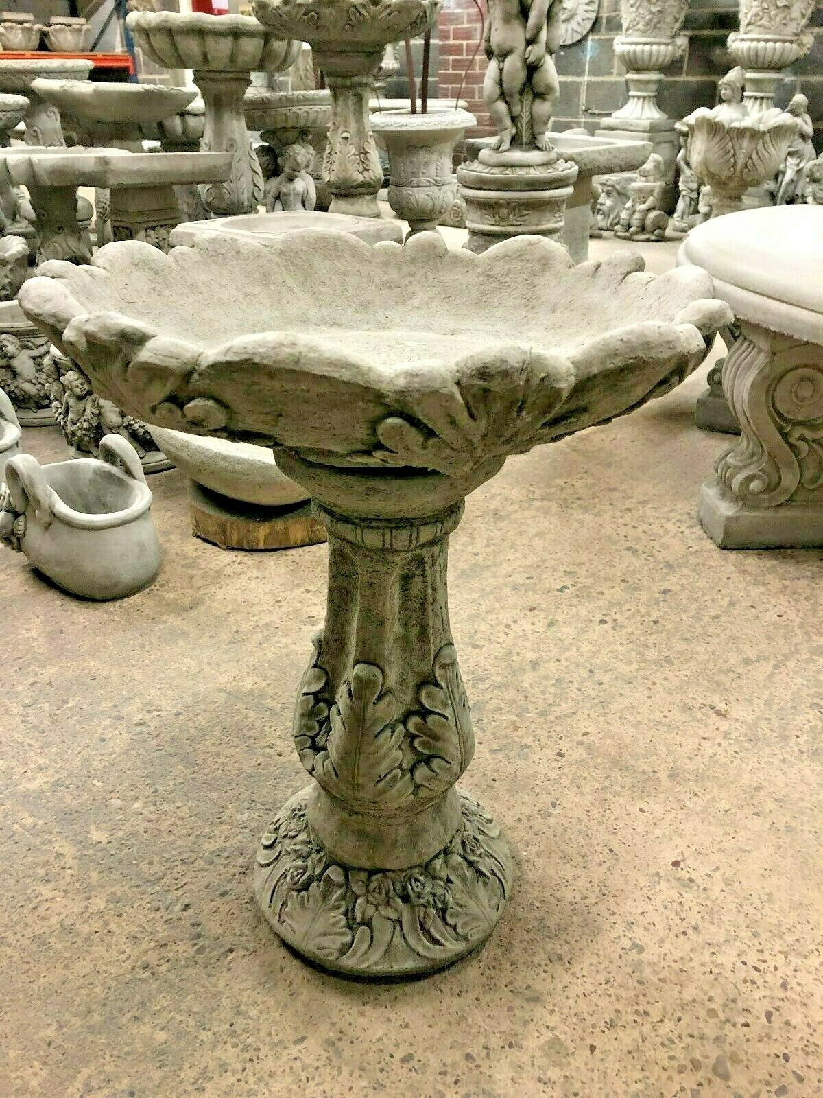Stone Leaf Design Bird Bath with scalloped edge and detailed foliage motifs, durable limestone garden ornament for birds.