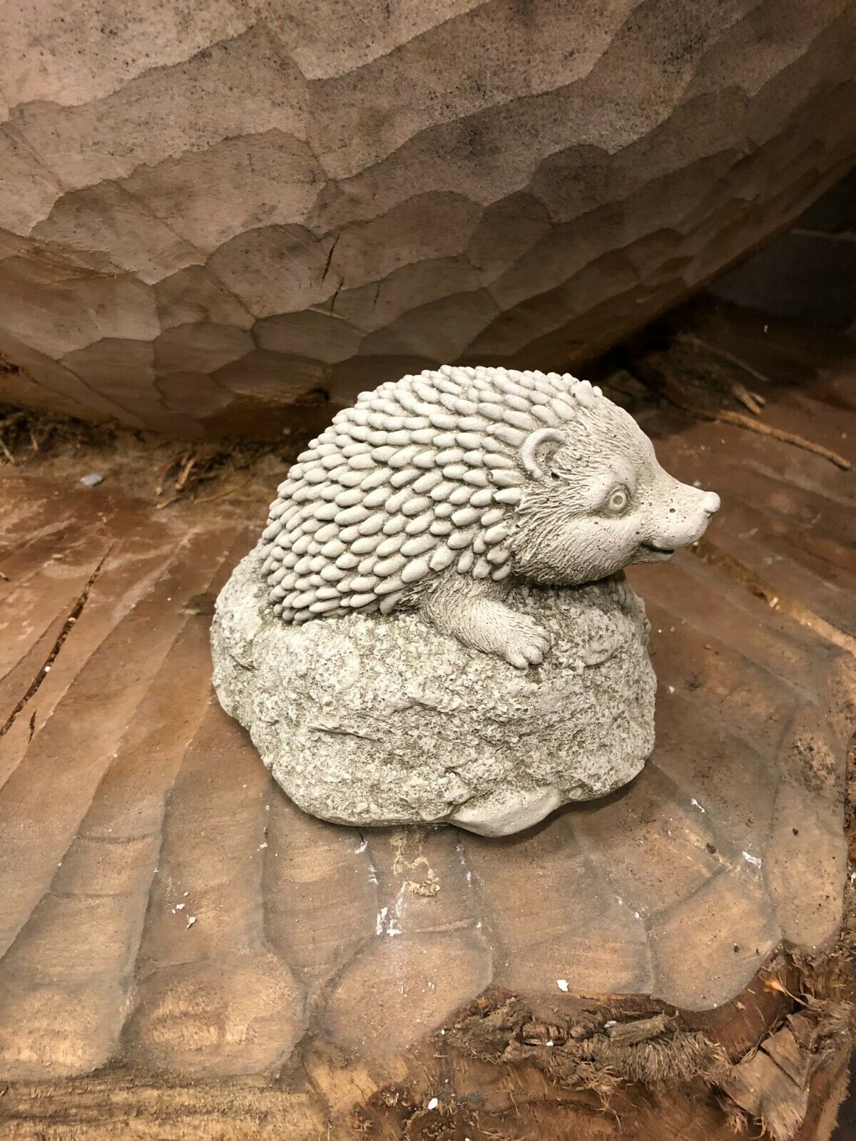 Side view of Stone Baby Hedgehog Ornament in antique grey stone finish, designed for lawns, patios, or garden sculptures.