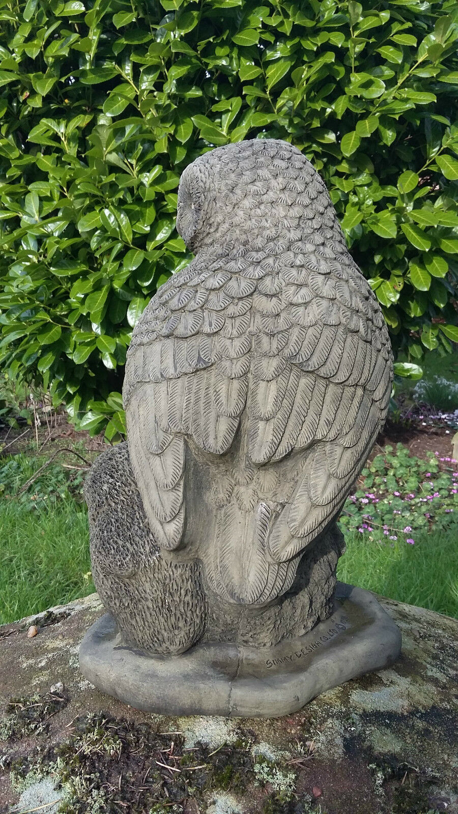 Side angle of the Stone Owl & Owlets Garden Statue highlighting textured wings and lifelike design, perfect for enhancing garden aesthetics.
