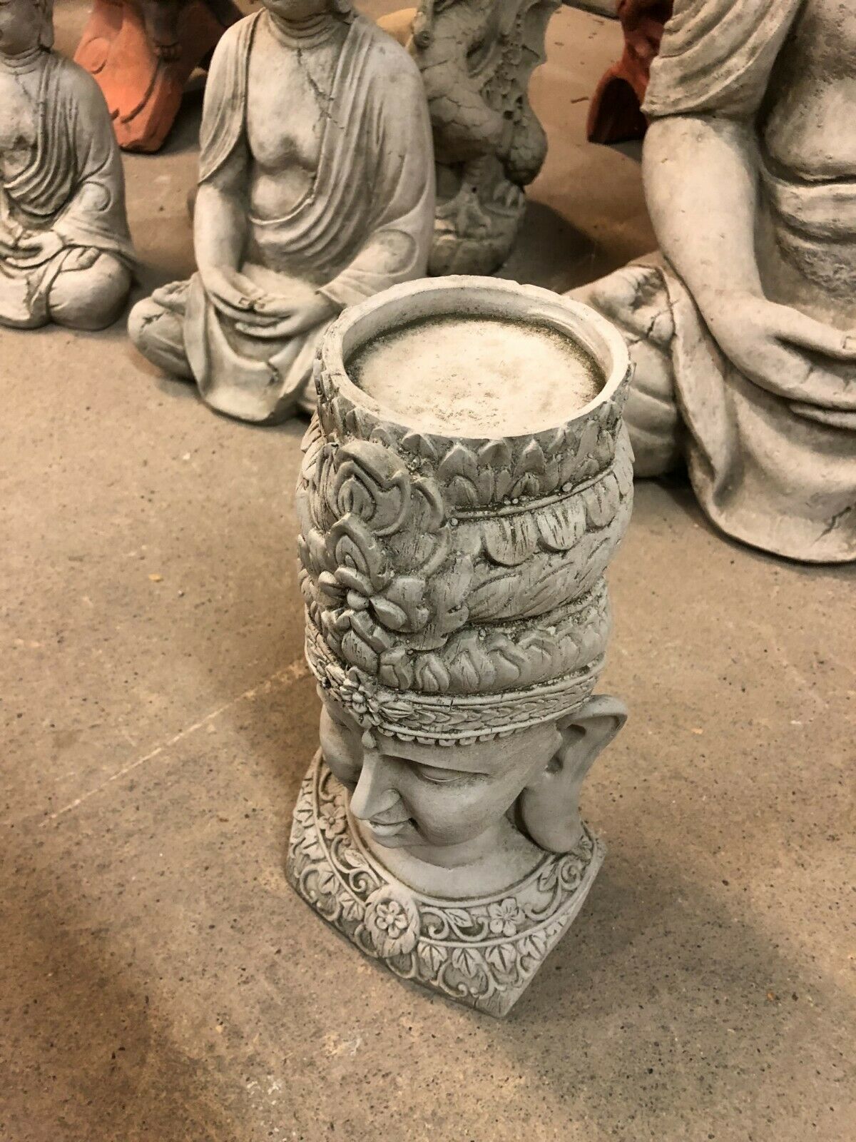 Top view of Tranquil Stone Buddha Bust Garden Ornament showing open crown design, perfect for decorative or functional garden use.