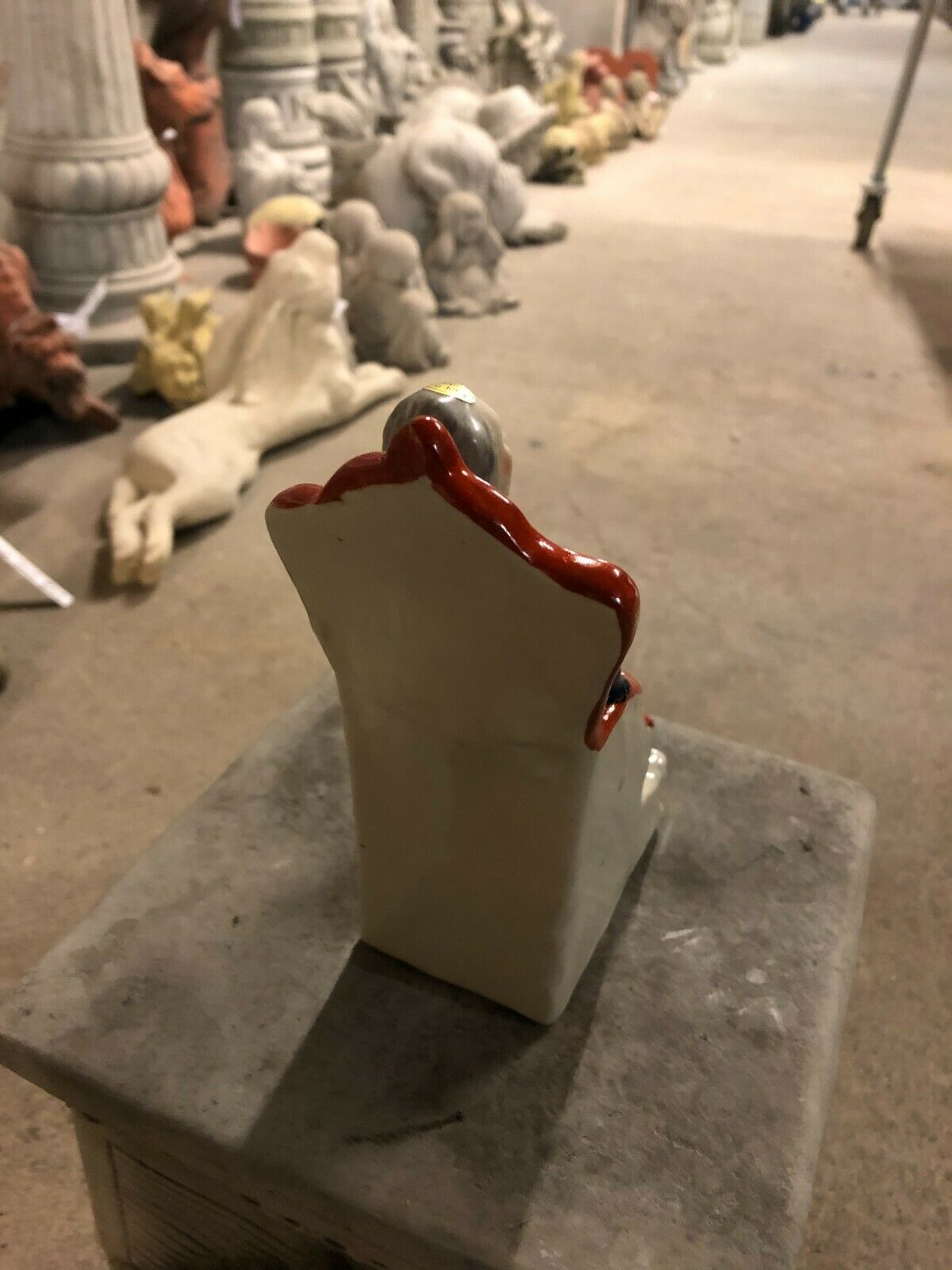 Ceramic Duke Wellington Ornament - Handcrafted Art | Free UK Delivery. Rear view of ceramic ornament showing red chair back and smooth glazed finish.