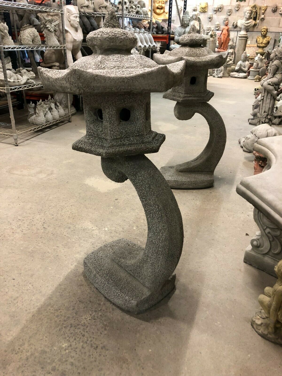 Oriental stone pagoda lantern statues with weather-resistant finish, perfect for patios, flowerbeds, or lawn decoration.