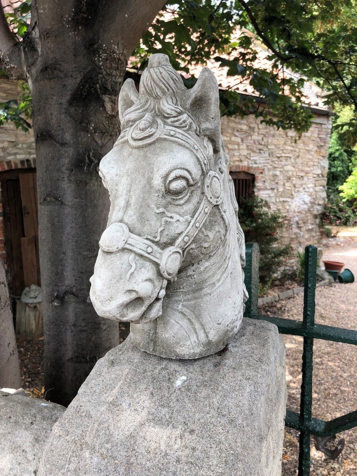 Stone Horse Head Finial-Limestone Garden Decor | Made in UK. Classic stone horse head finial with bridle accents, perfect for enhancing outdoor spaces.