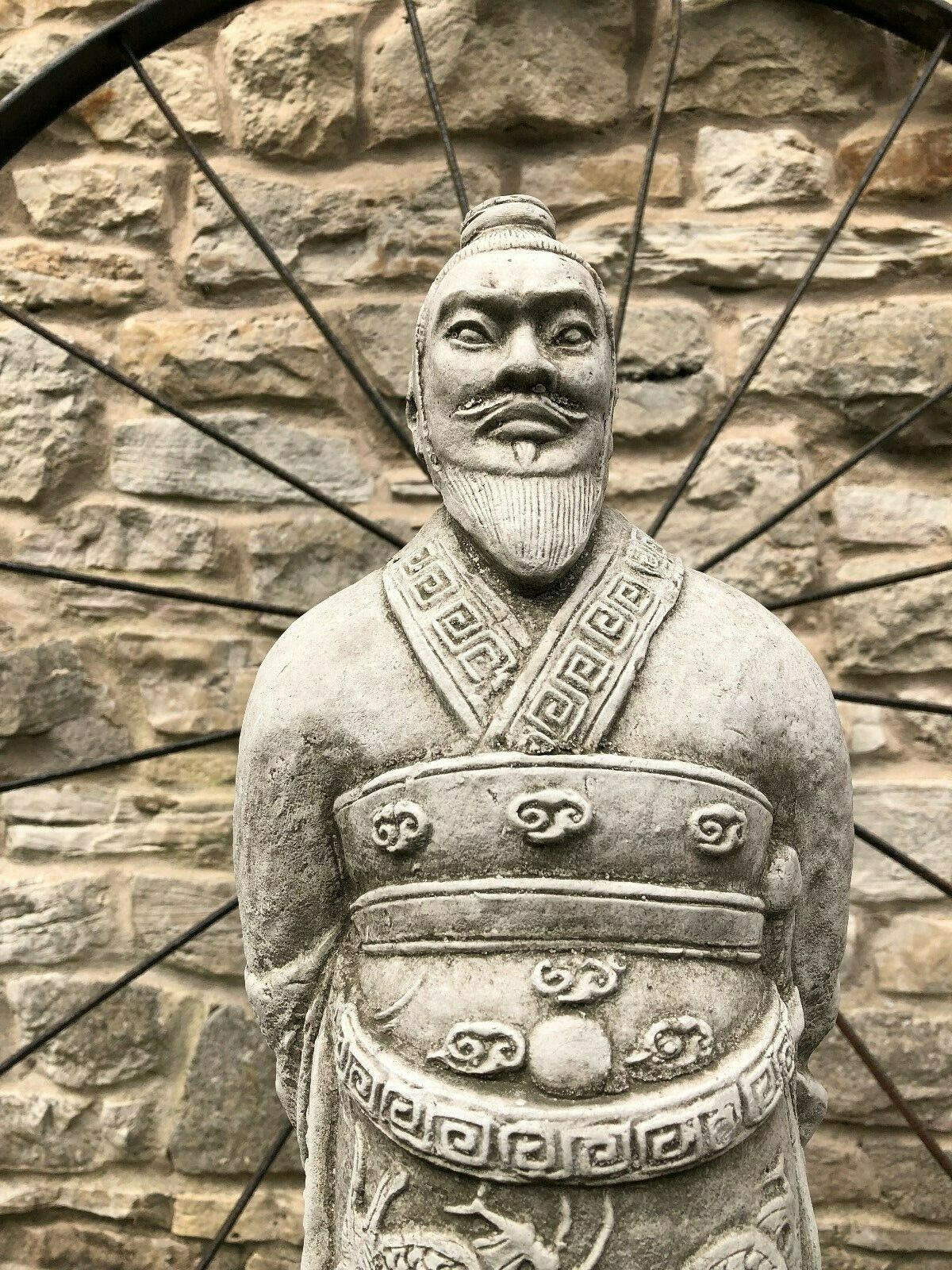 Close-up of the Zhan Shi Warrior Garden Statue's detailed facial features and ornate armor, showcasing fine craftsmanship in limestone sculpture.