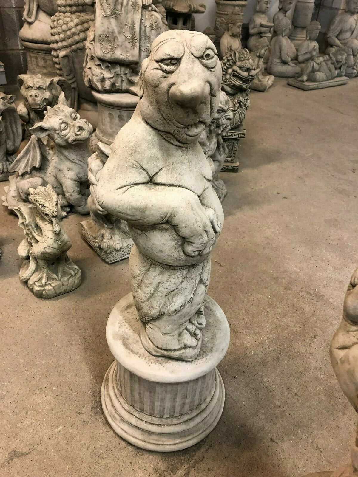 Side profile of humorous stone garden statue with exaggerated features, part of Bare Knuckle Boxer Statues - Garden Ornaments.