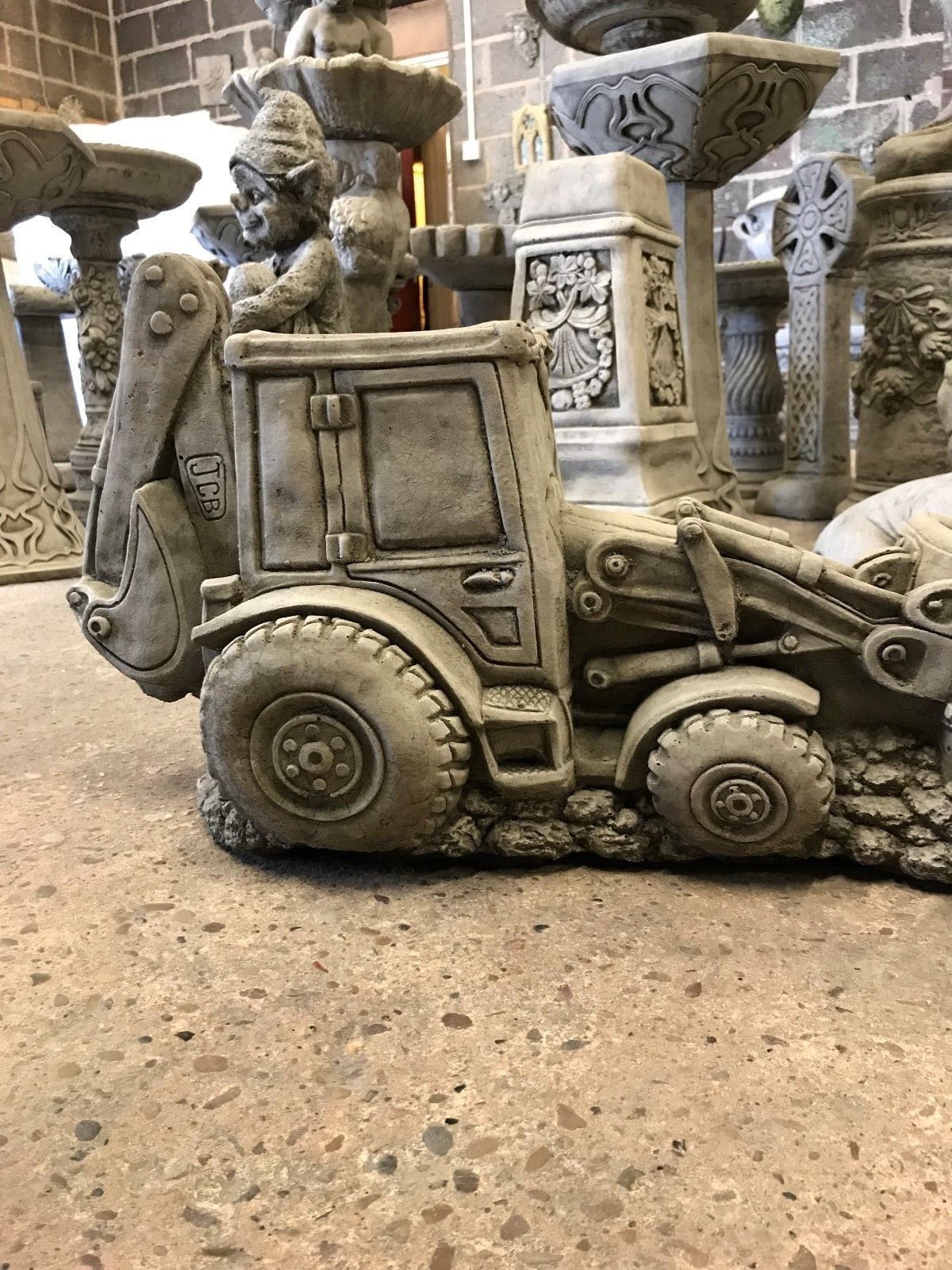 JCB Shovel Digger Planter - Garden Feature | Heavy & Durable side profile of limestone digger planter, ideal for garden or patio display.