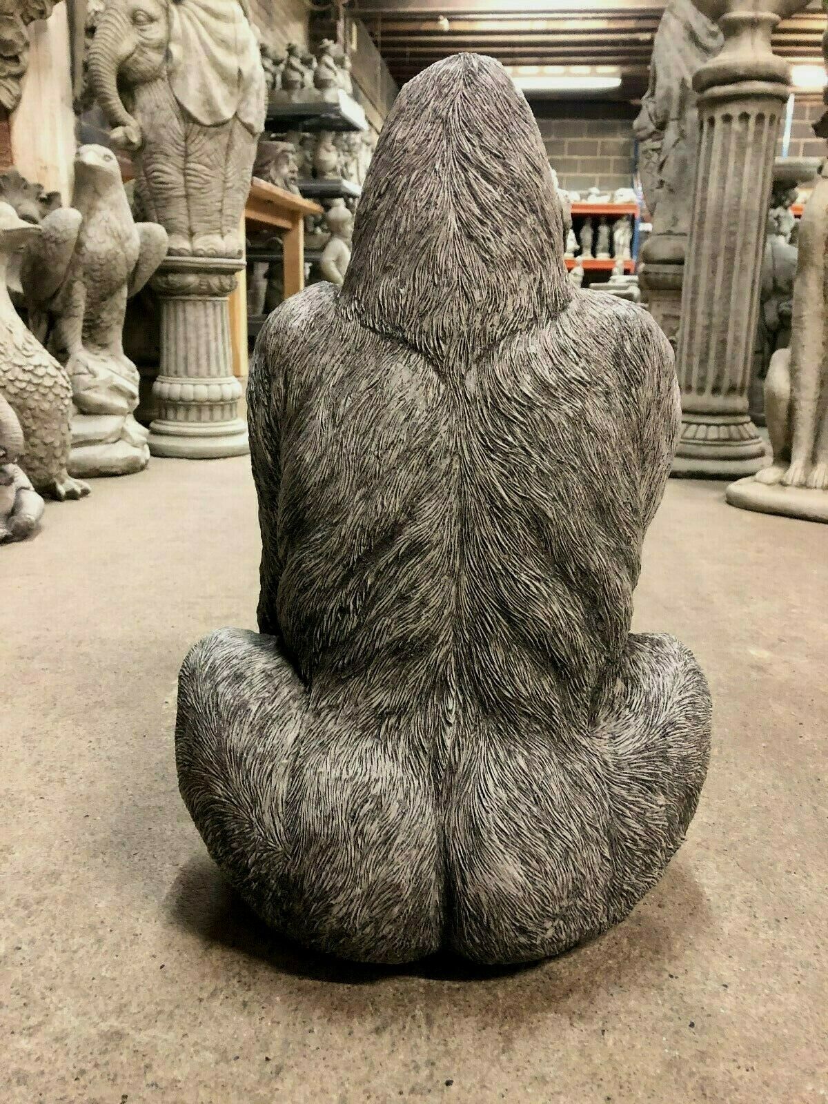 Back view of Stone Silverback Gorilla Statue showcasing lifelike fur texture, perfect for home and garden sculpture collections.