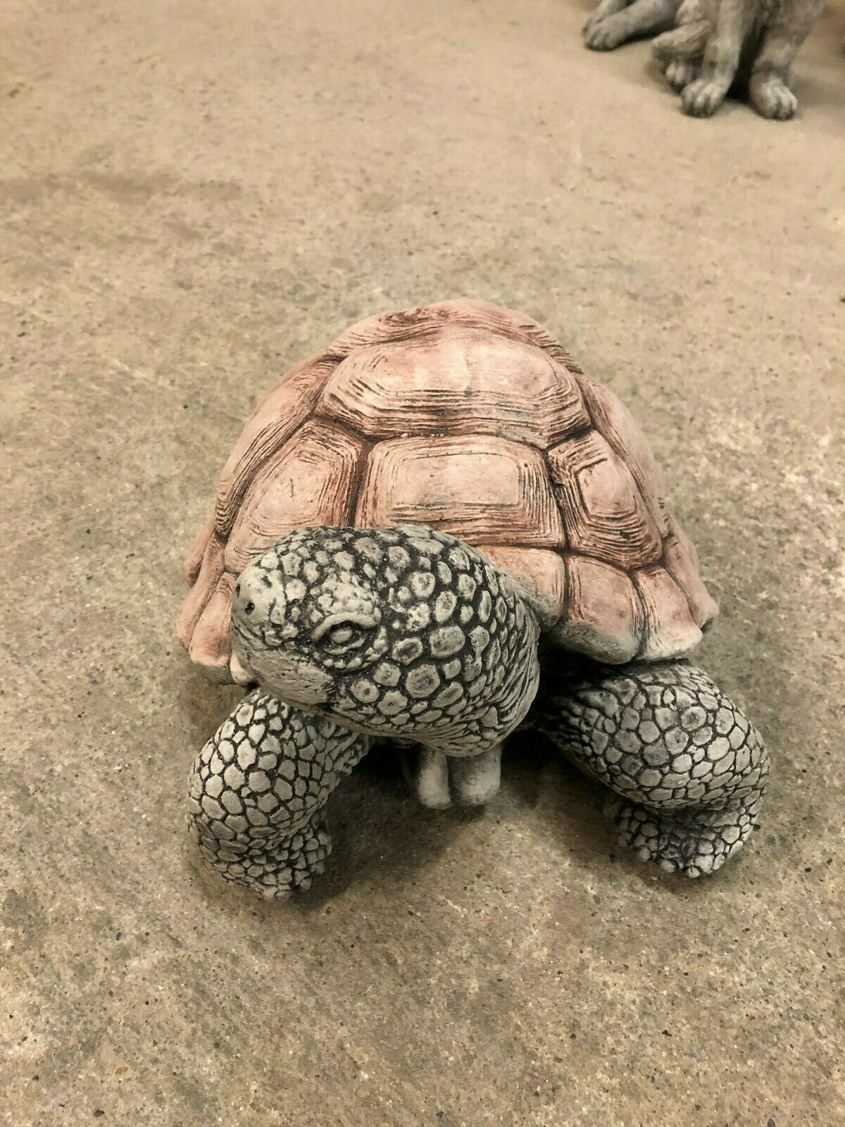 Detailed tortoise garden sculpture with antique stone finish, made from solid limestone. Enhances home and garden aesthetics.