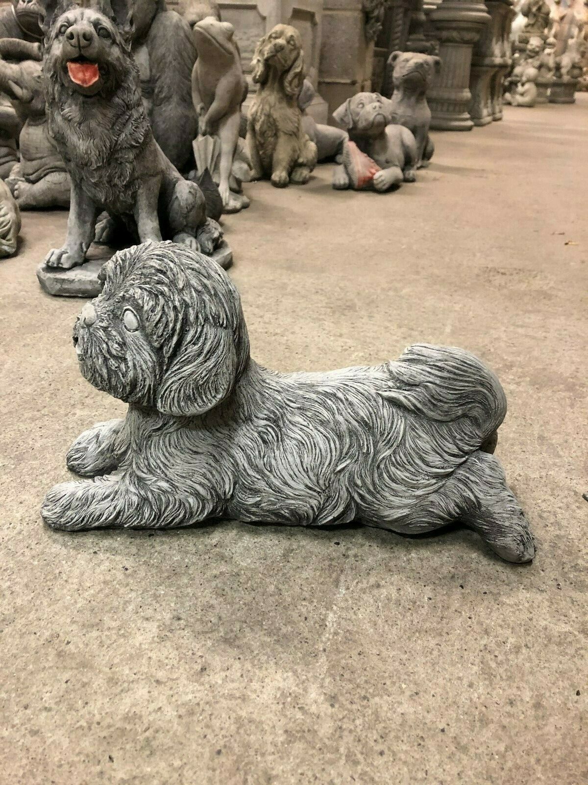 Side view of Antique Shih Tzu Stone Garden Ornament showing detailed fur texture. Perfect for patios, lawns, or flowerbeds in home gardens.