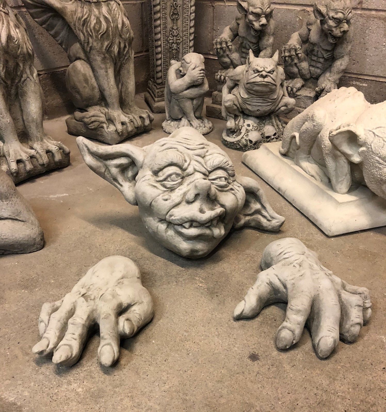 Stone Zombie Set Ornaments - Garden Decor|Limestone, Weatherproof. Durable limestone zombie head and hands set among gothic garden statues.