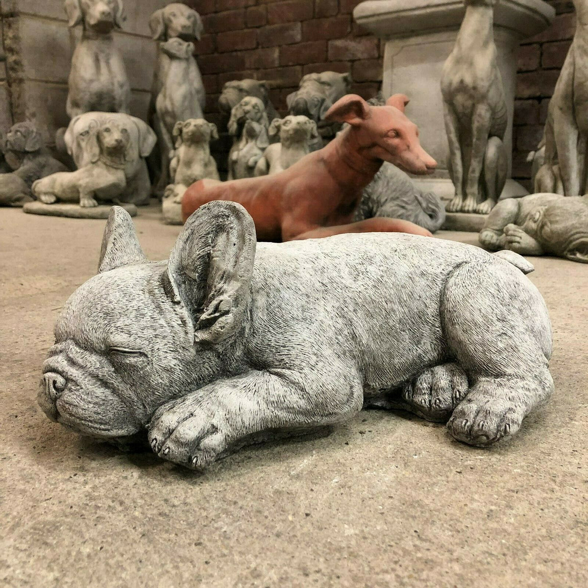French Bulldog Garden Ornament - Stone Sleeping | Solid sculpture of a resting Frenchie, ideal for outdoor garden decor or patio accents.