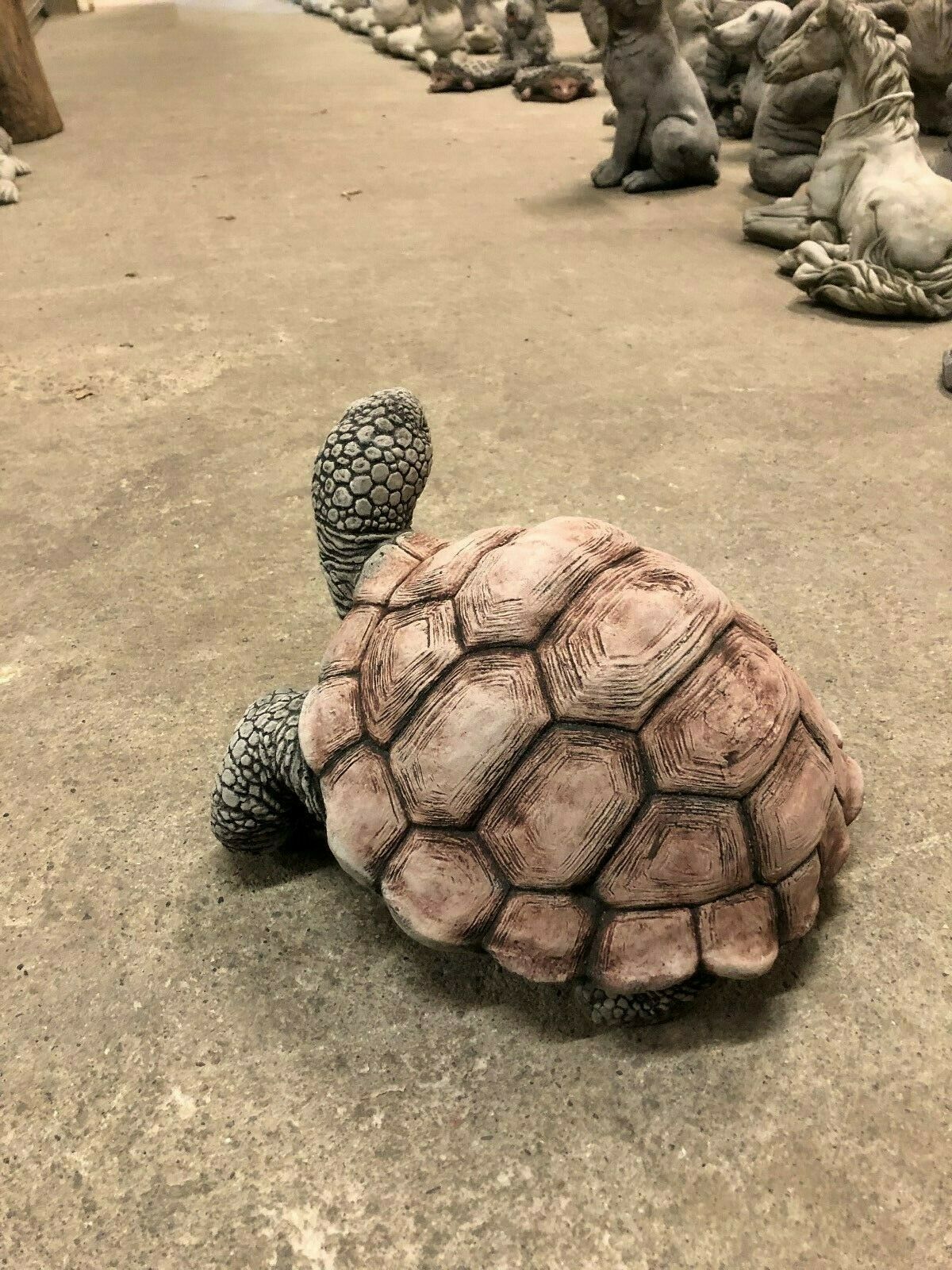 Back view of large tortoise garden ornament showing shell texture and craftsmanship. Weatherproof and ideal for outdoor display.