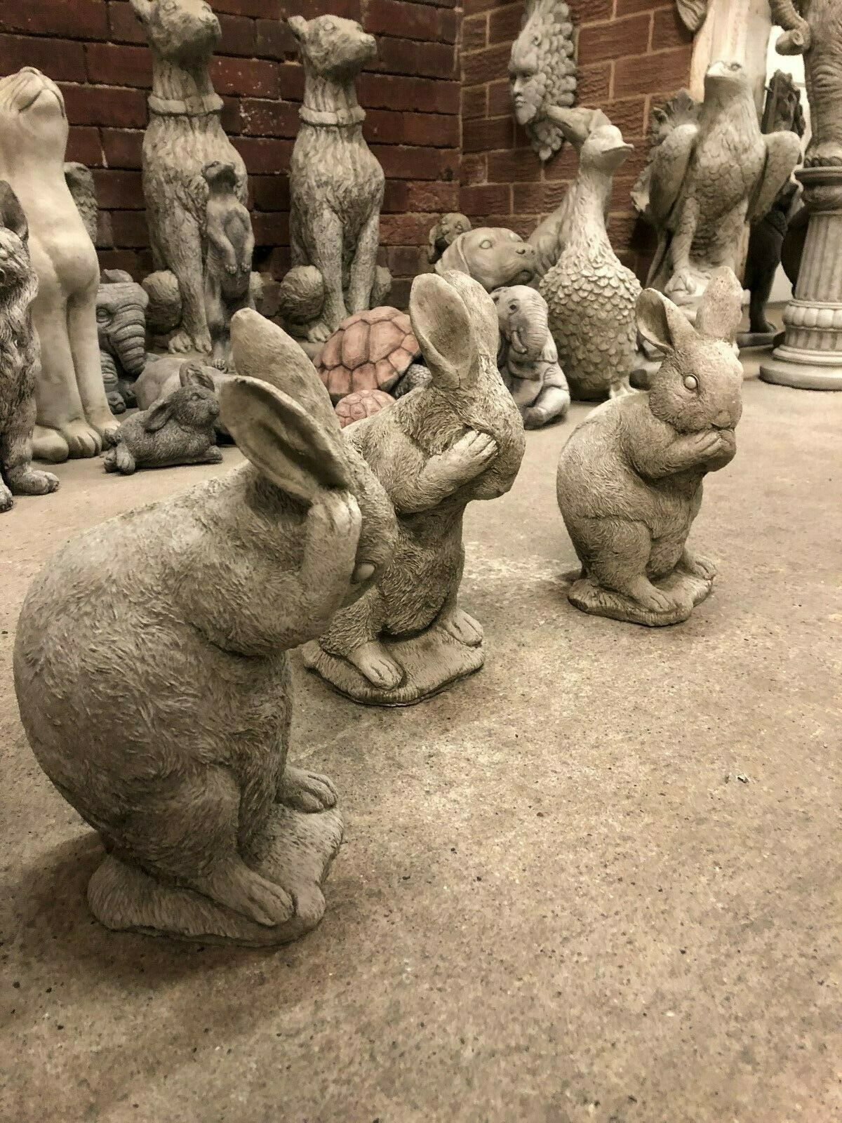 Rabbit Trio Statues - Stone Hear See Speak No Evil garden decor featuring three hand-crafted limestone rabbits in classic wise poses.