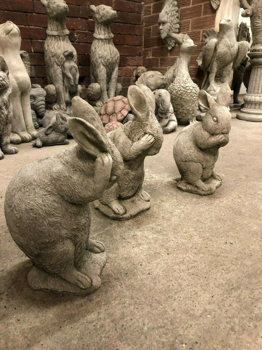Rabbit Trio Statues - Stone Hear See Speak No Evil garden decor featuring three hand-crafted limestone rabbits in classic wise poses.