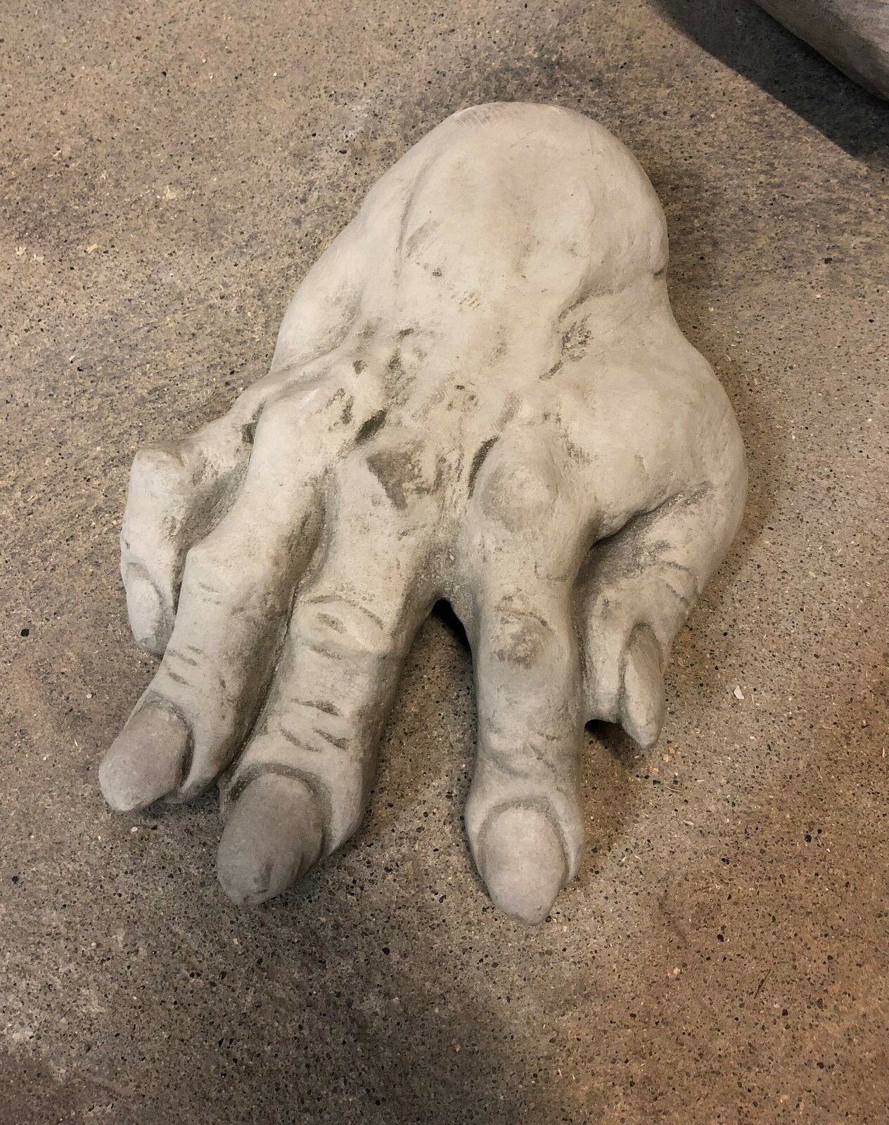 Stone Zombie Set Ornaments - Garden Decor|Limestone, Weatherproof. Close-up of a weatherproof zombie hand sculpture with realistic texture and detail.