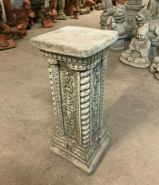 Stone garden column with antique finish, tall square plinth ideal for outdoor ornament display. Features ornate detailing and weather-resistant limestone.