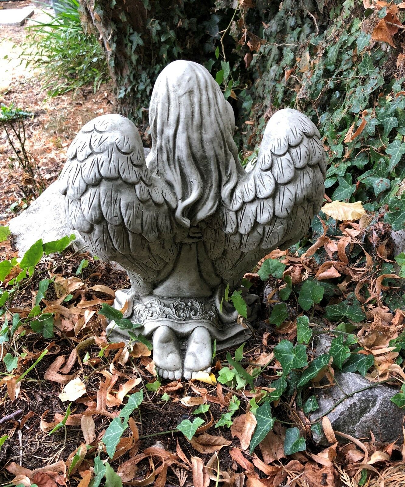 Back view of Stone Praying Angel Statue with detailed feathered wings and base, designed as a weather-resistant garden ornament.