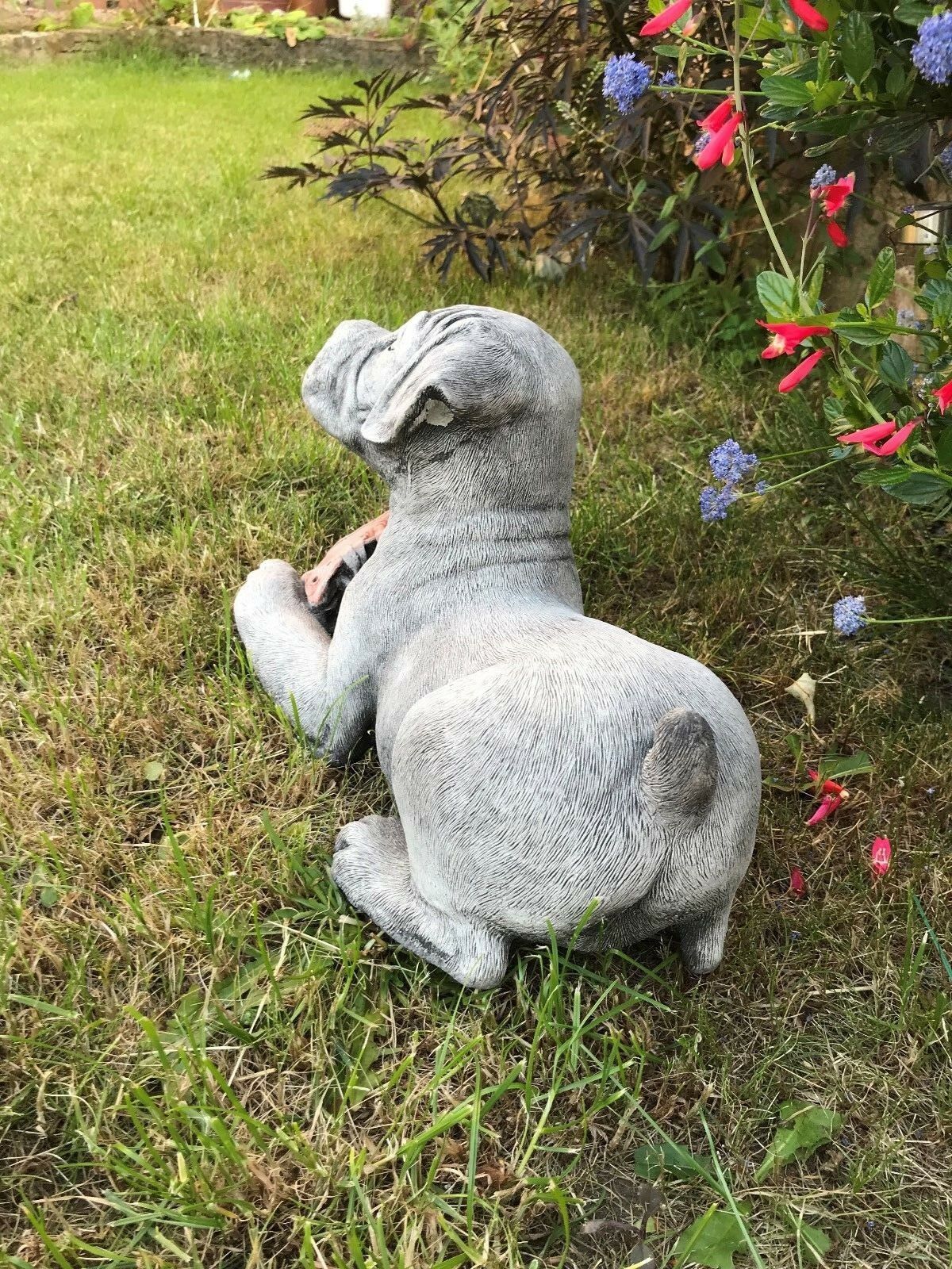 Back view of Boxer Puppy Ornament - Stone Sculpture showing curled tail and textured finish, ideal for garden and patio decoration.