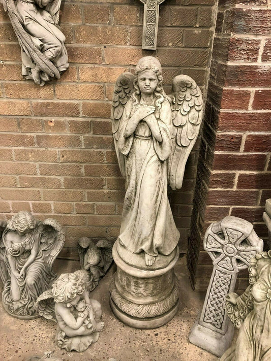Garden statue - stone angel pedestal with folded hands, weather-resistant limestone, ideal for outdoor garden or memorial decor.