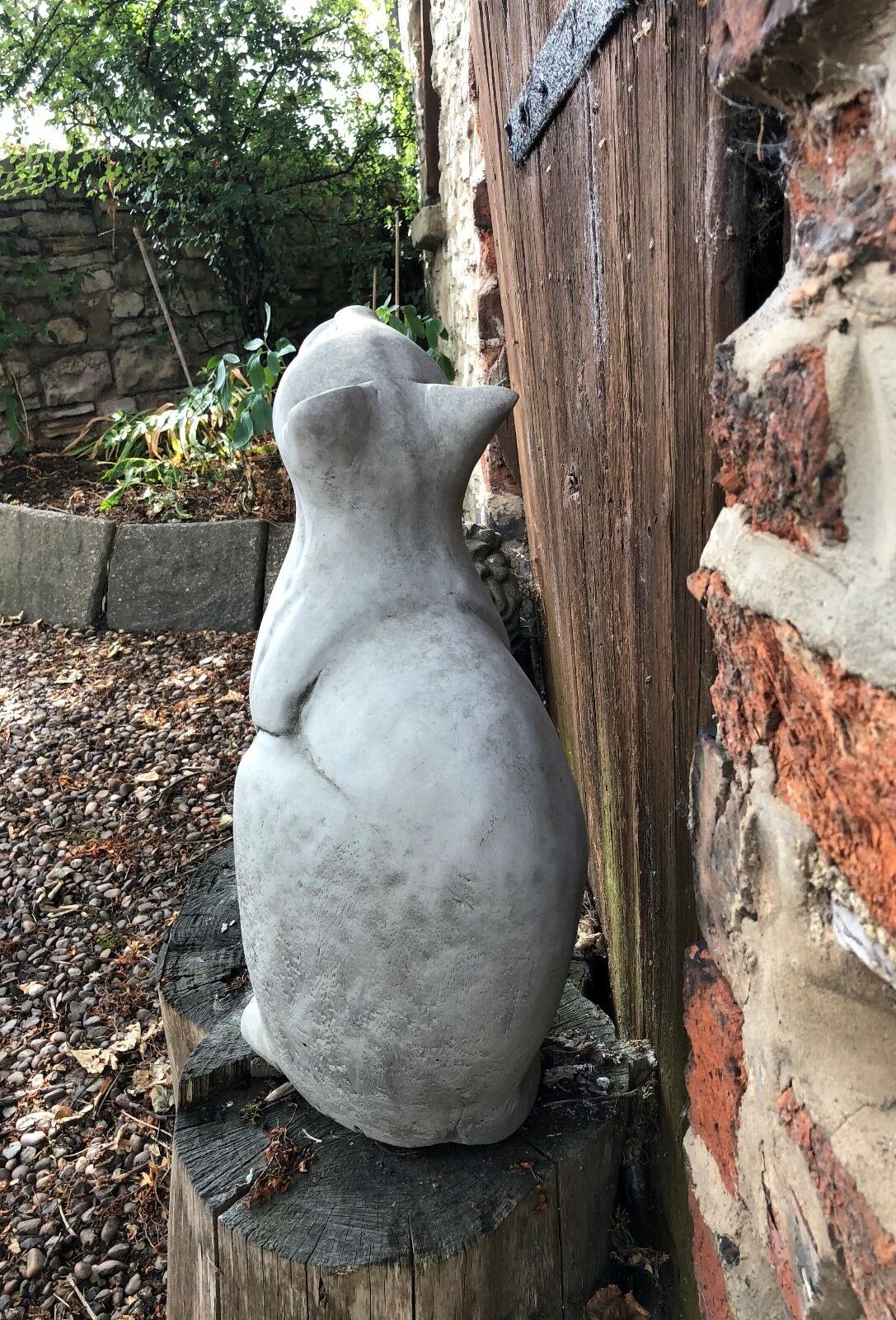 Rear view of Stone Cat Garden Ornament - Durable Stone, emphasizing solid limestone construction and weather-resistant design.
