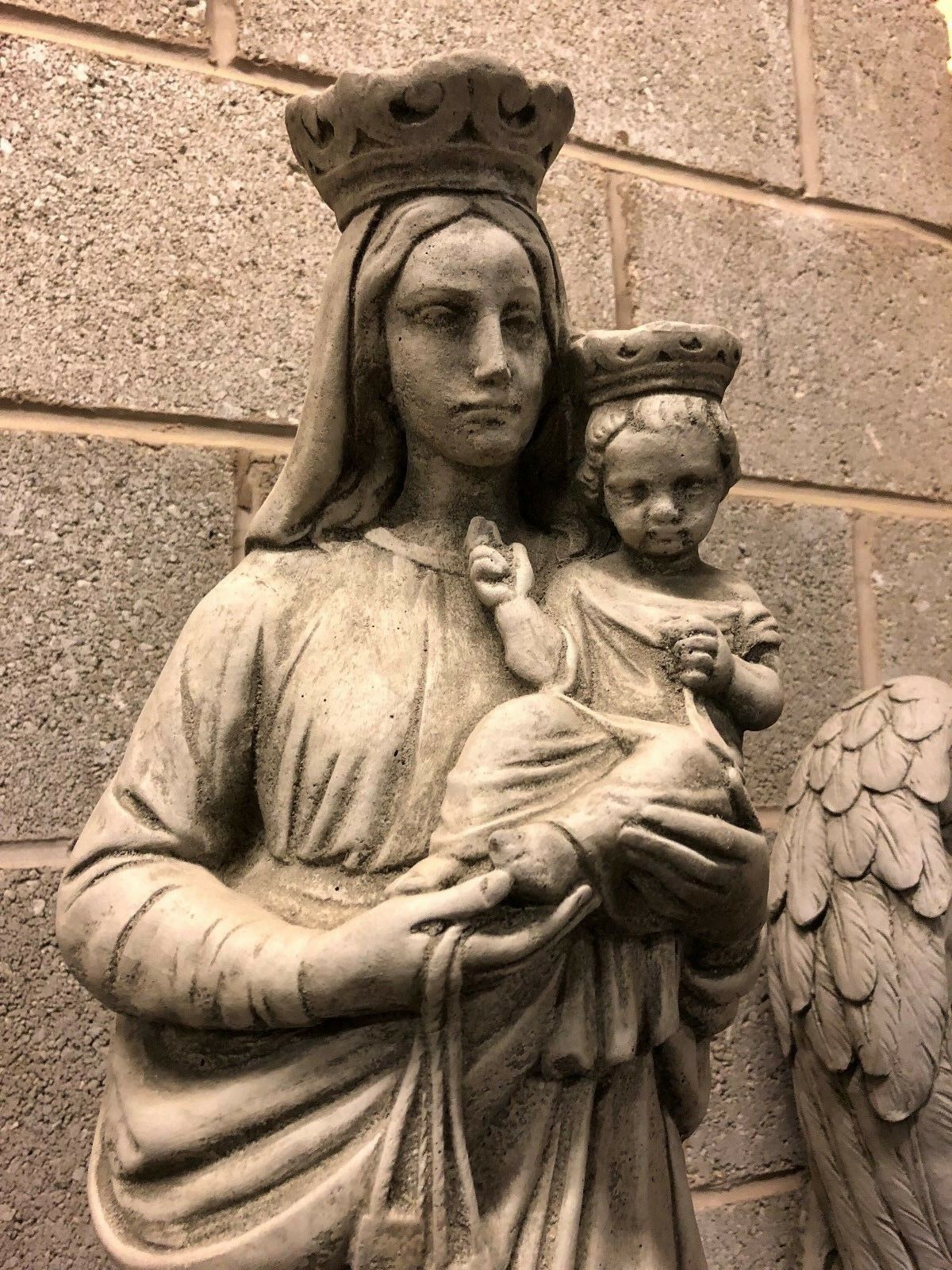 Close-up of Mary & Jesus statue showing fine craftsmanship in antique grey stone, ideal for Christian garden decor or patio sculpture.