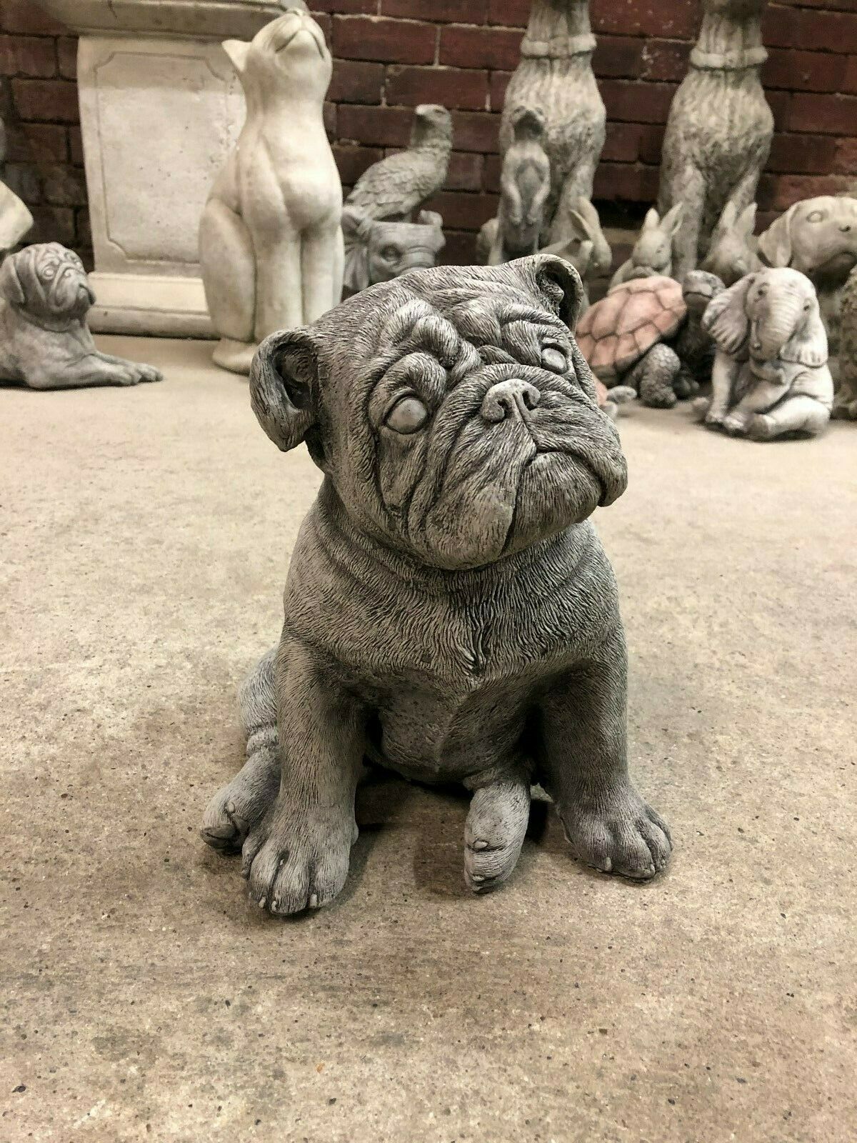 Durable Bulldog Stone Statue - British Puppy sitting upright with detailed facial features, ideal for garden or patio decor.