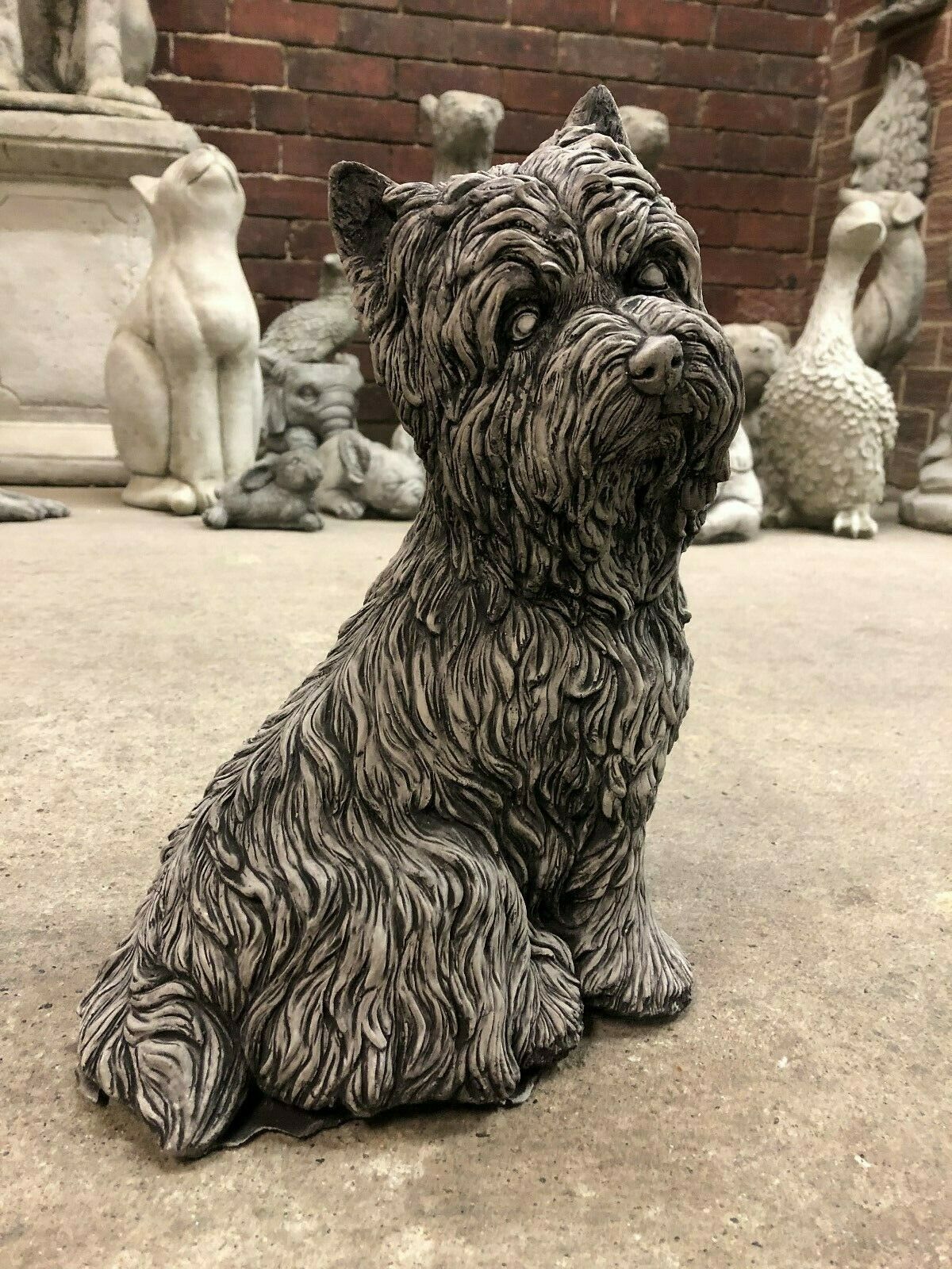 Westie Dog Statue - Stone Sculpture with antique grey finish, ideal for garden decor. Realistic detailing in durable limestone for outdoor display.