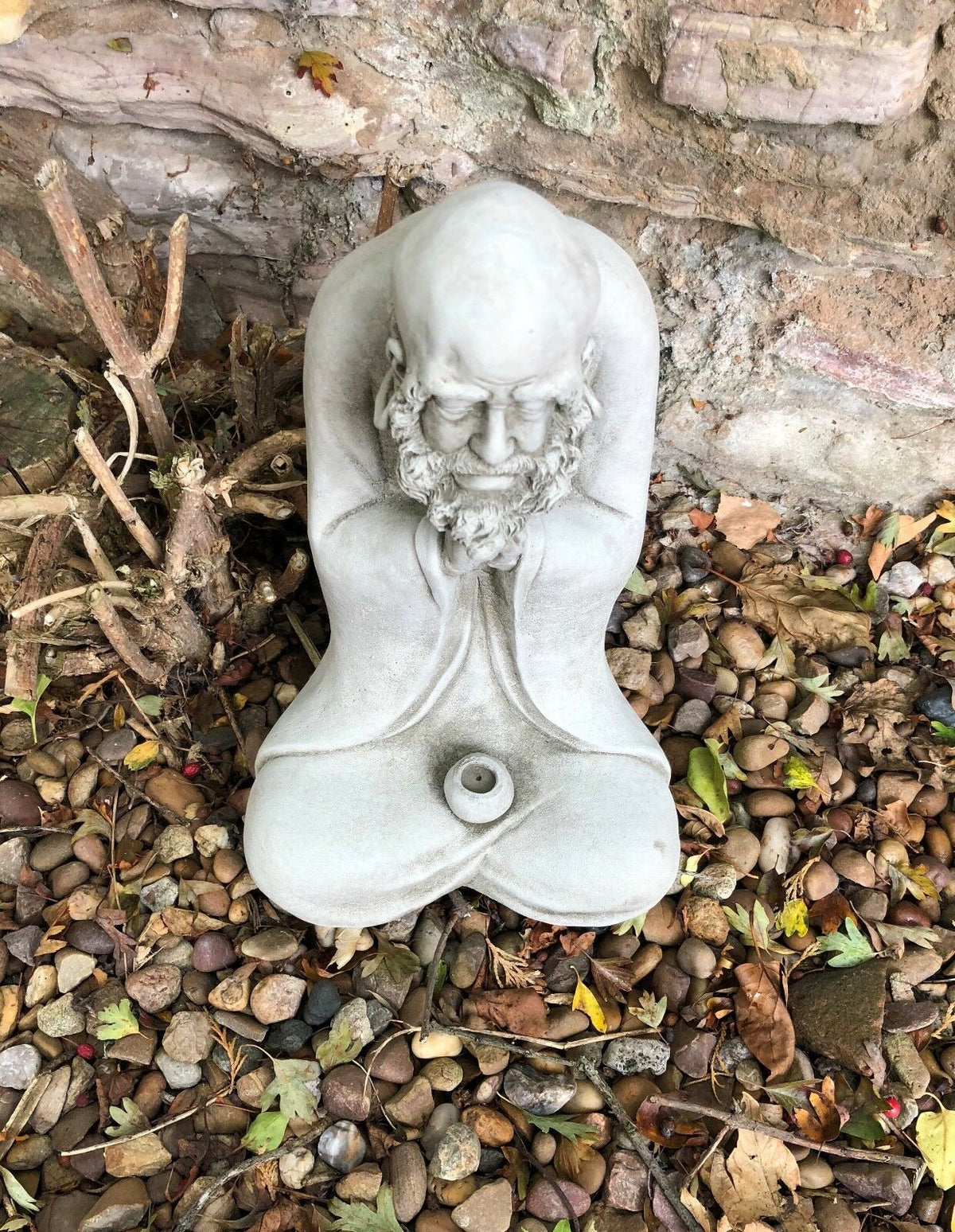 Top-down view of the Stunning Stone Praying Old Monk Sculpture Garden Ornament showing the monk's bowed head and prayerful hands.